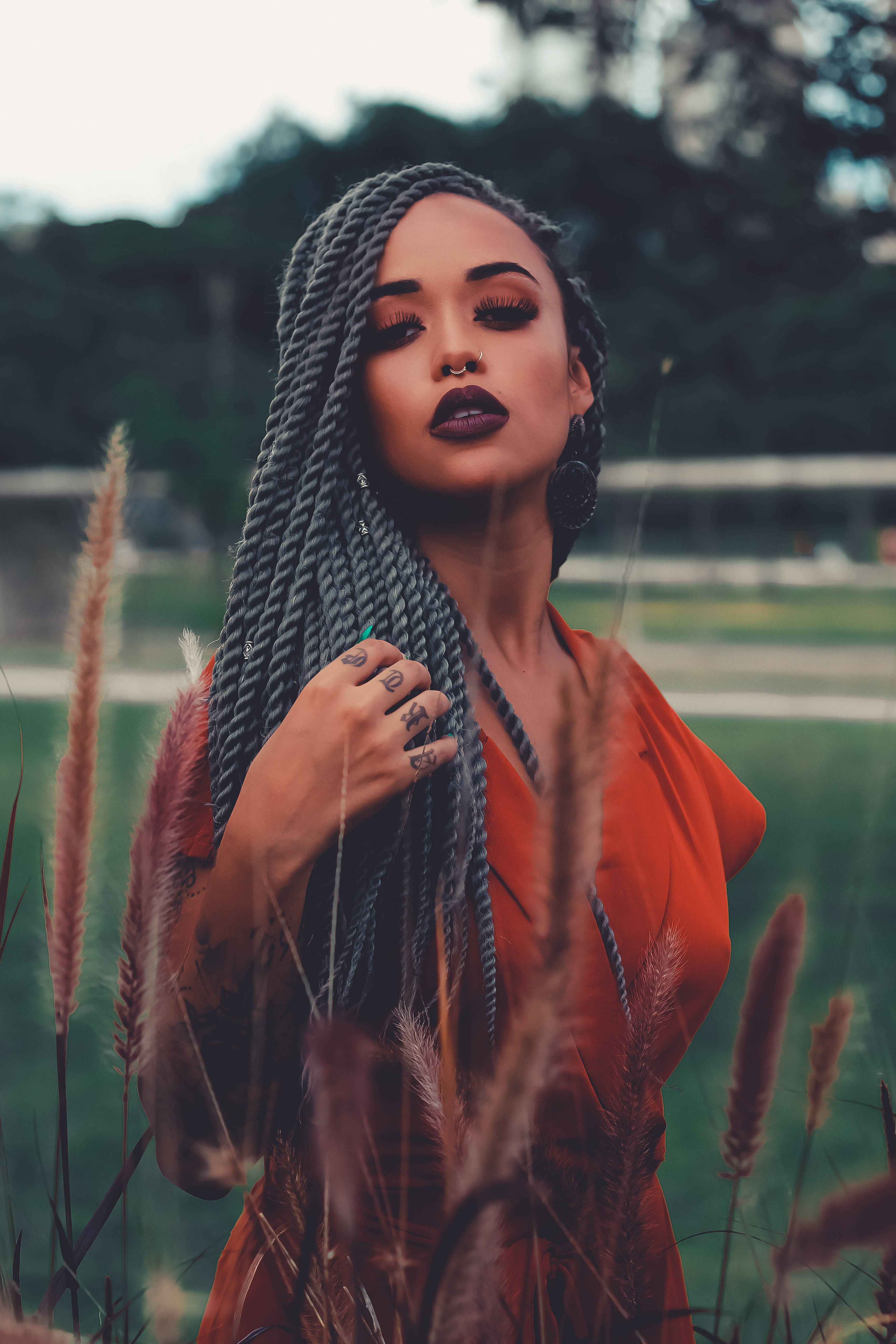 long grey braids, bold makeup, tall grass, 5K Phone Wallpaper