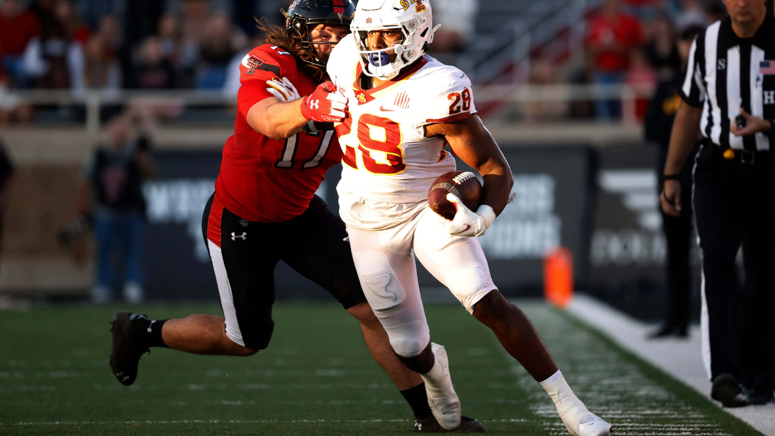 Breece Hall, white jersey number 28, red jersey player, 2K Desktop Wallpaper