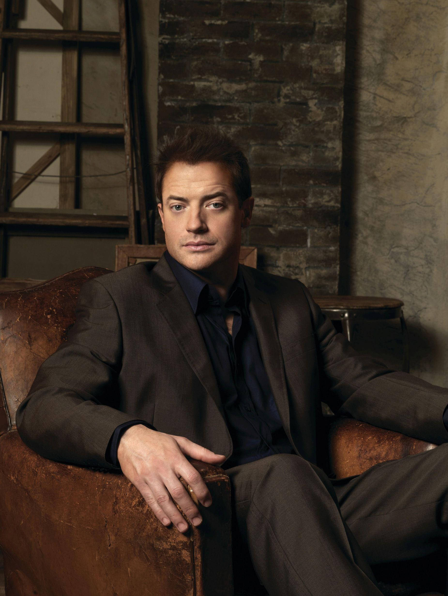 Brendan Fraser, dark suit, worn leather armchair, Full HD Phone Wallpaper