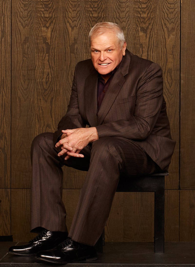 Brian Dennehy, brown suit, wood-paneled wall, SD Phone Wallpaper