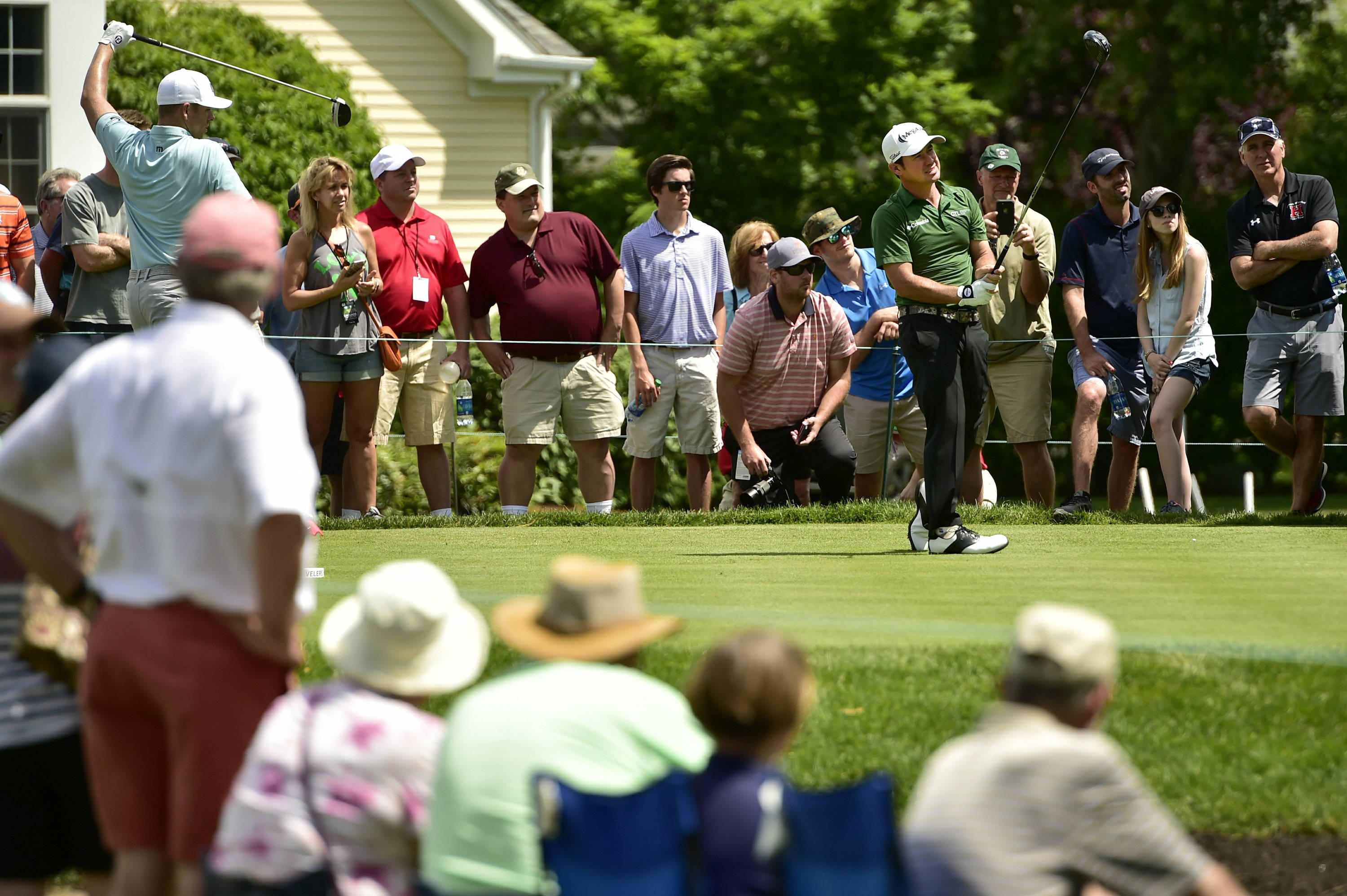 Brian Harman, tee shot, sunlit green course, 2K Desktop Wallpaper