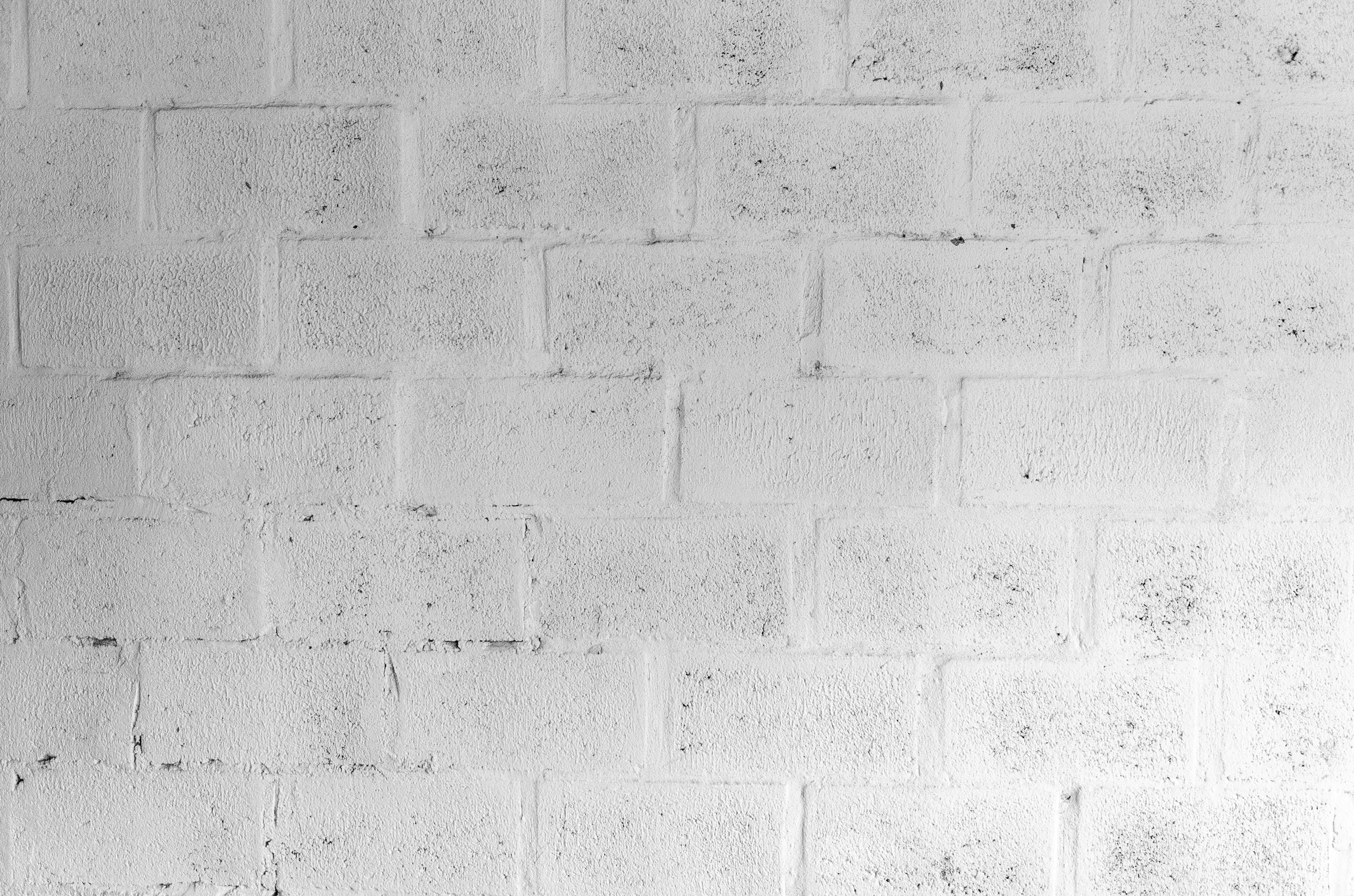 white brick wall, weathered, subtle texture, 2K Desktop Wallpaper