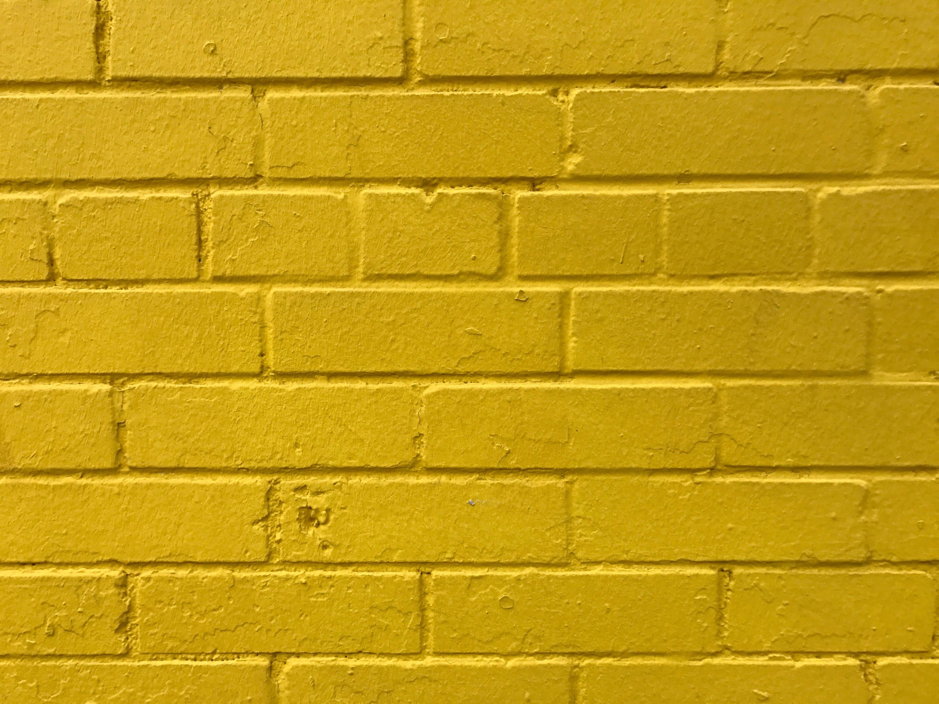 golden brick wall, textured yellow brick wall, mortar lines, 2K Desktop Wallpaper