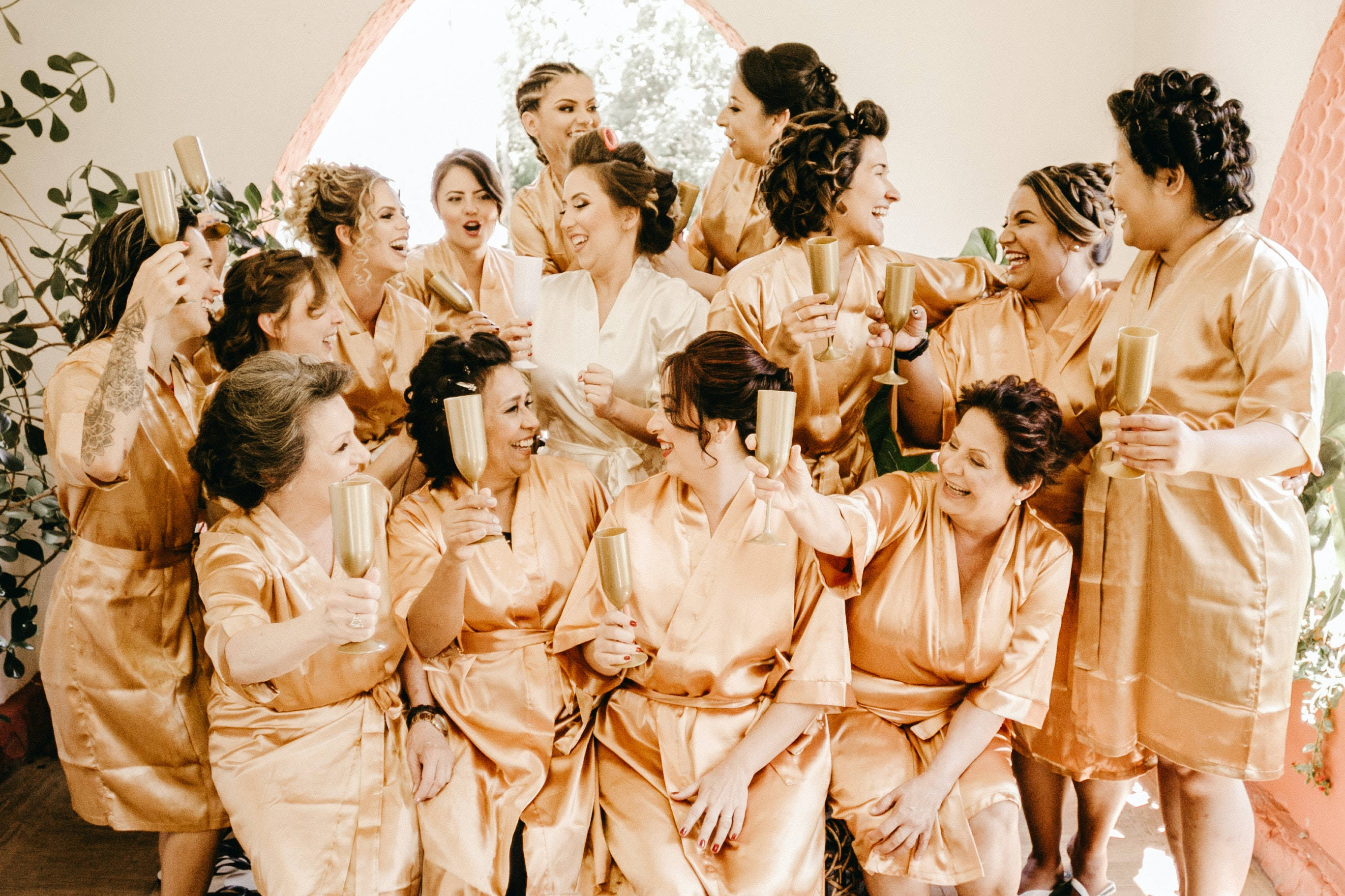 peach satin robes, champagne flutes, warm natural light, 2K Desktop Wallpaper