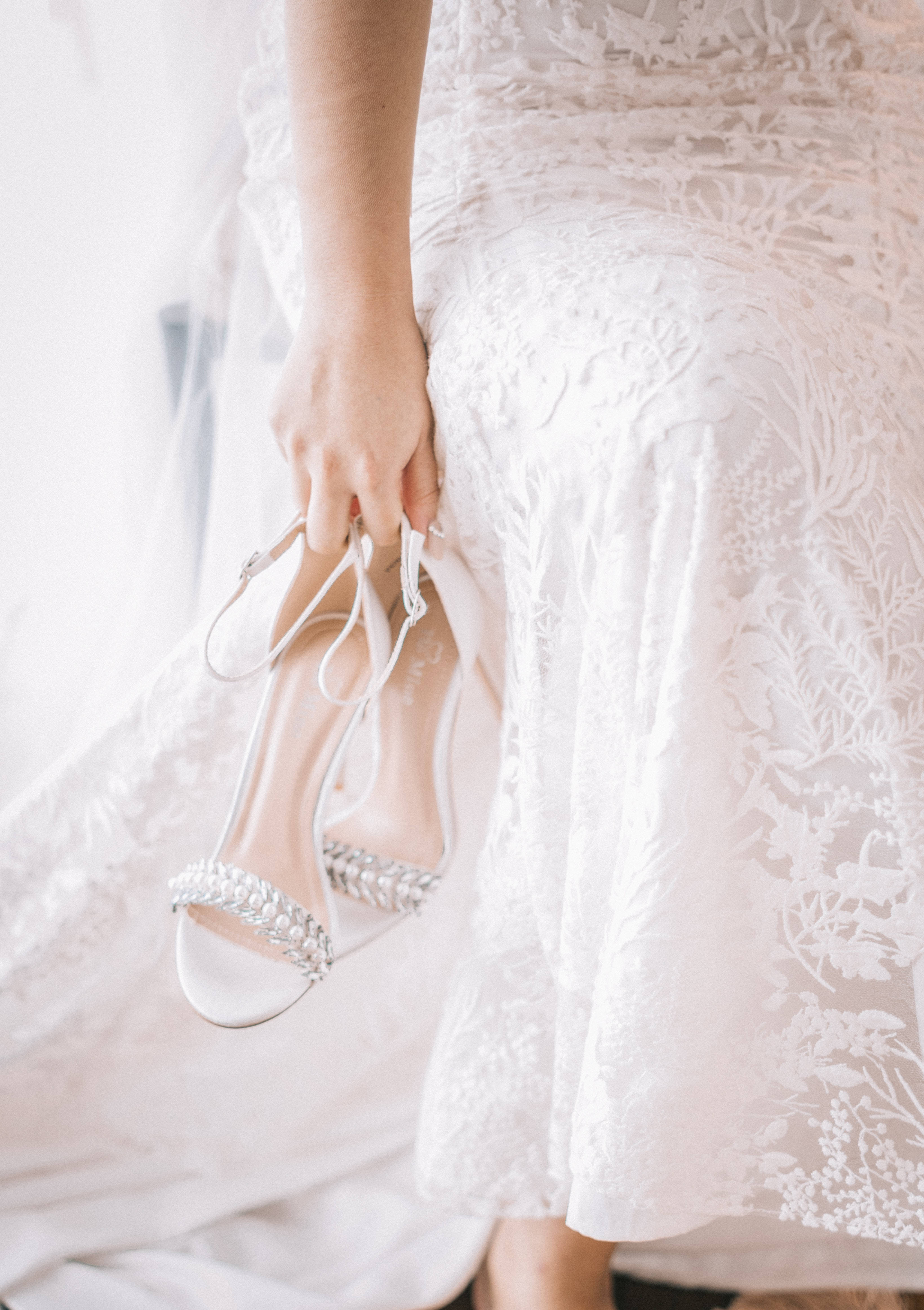 white lace gown, sparkling silver heels, soft natural light, 4K Phone Wallpaper
