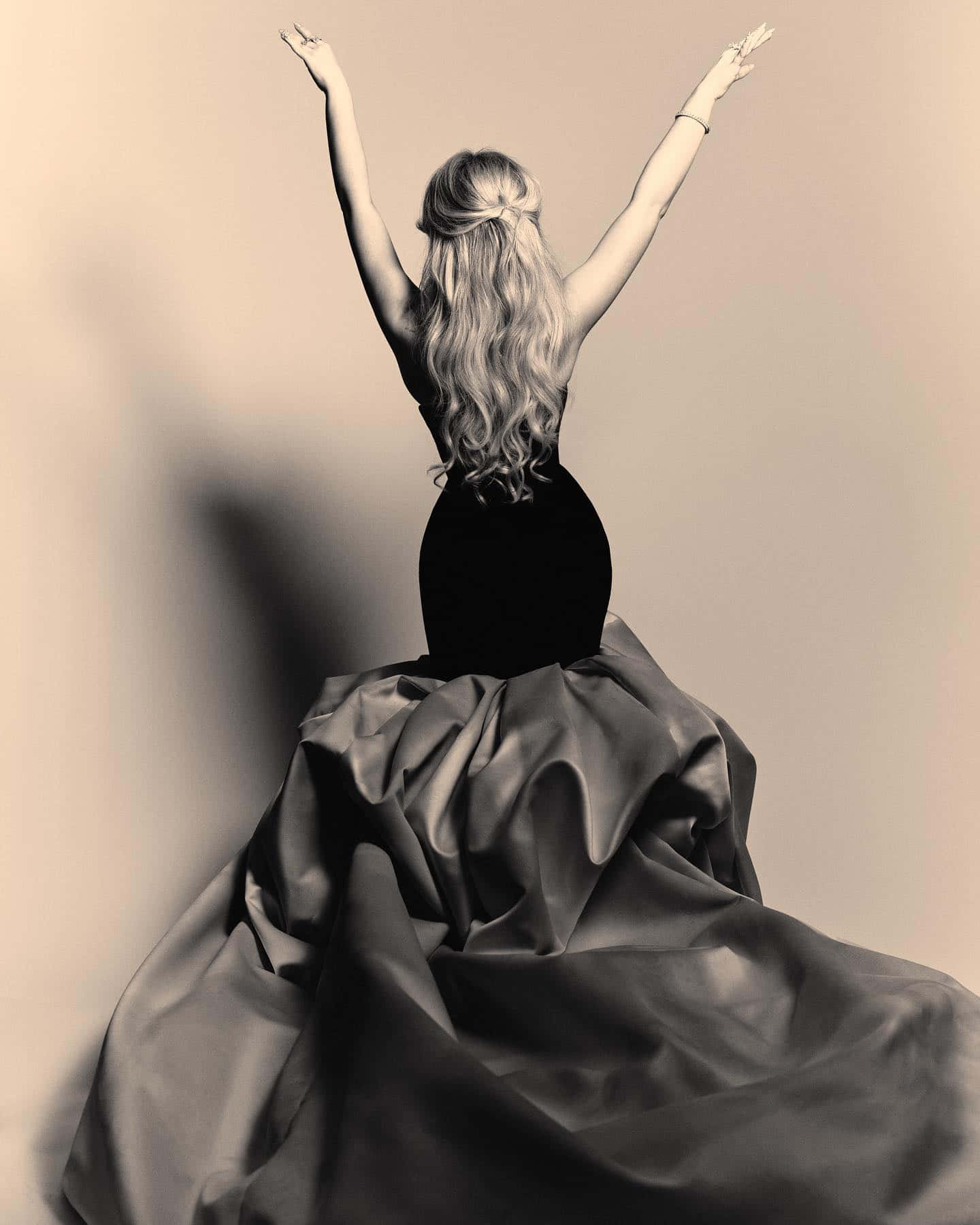voluminous satin gown, backlit against a plain wall, soft shadow, HD Phone Wallpaper