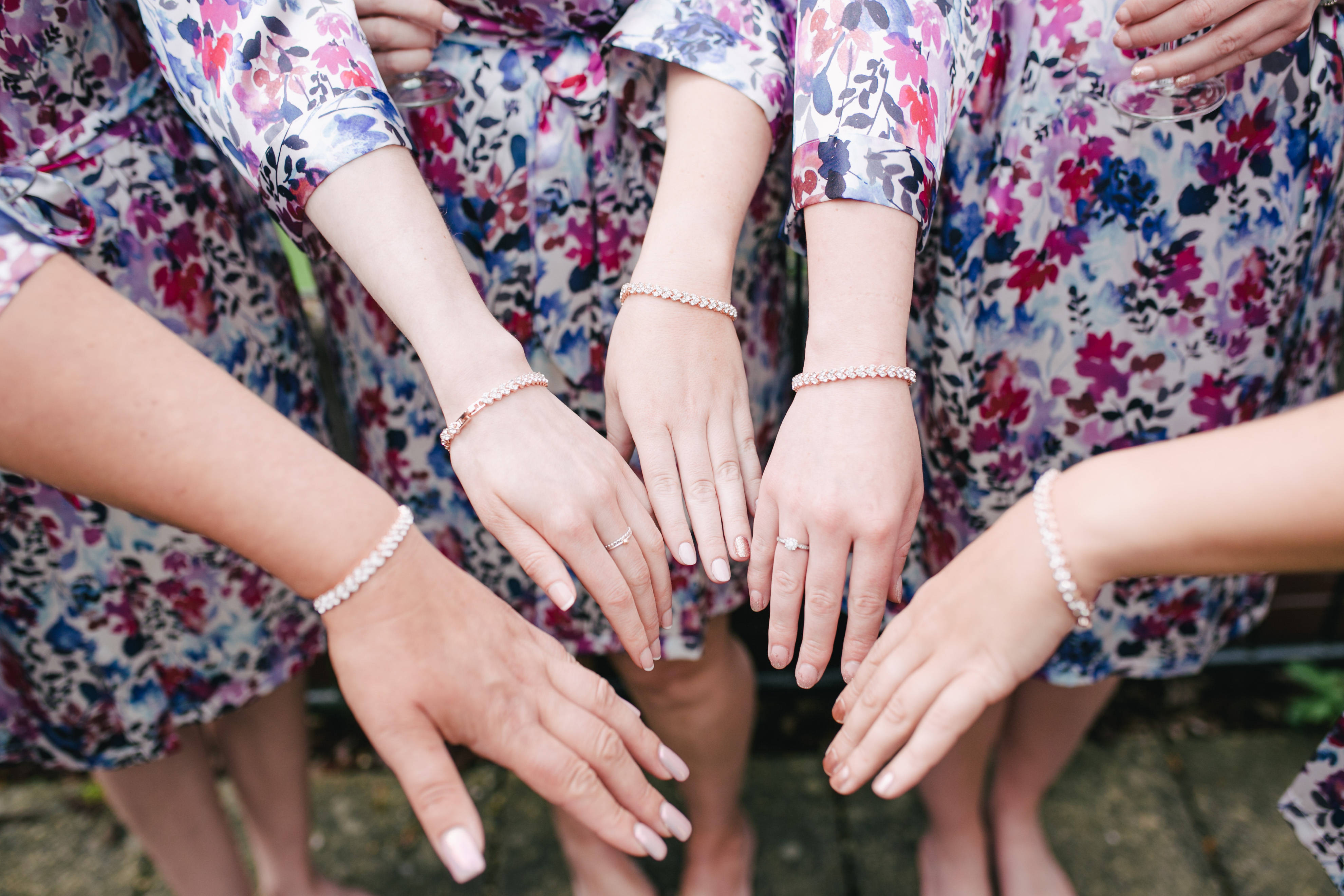 Bridesmaids, floral dresses, pearl bracelets, 4K Desktop Wallpaper