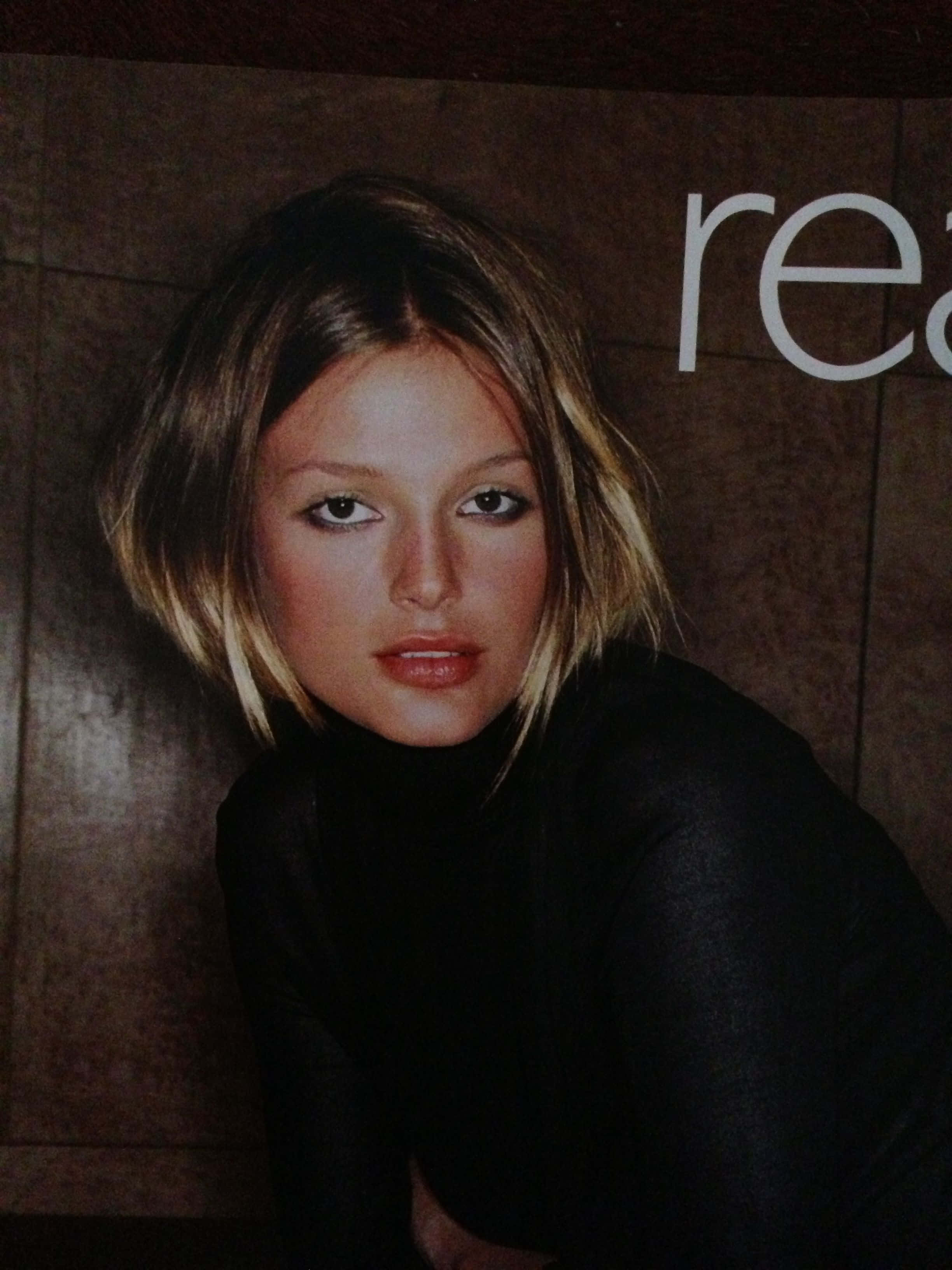 Bridget Hall, black turtleneck, short blonde hair, 2K Phone Wallpaper
