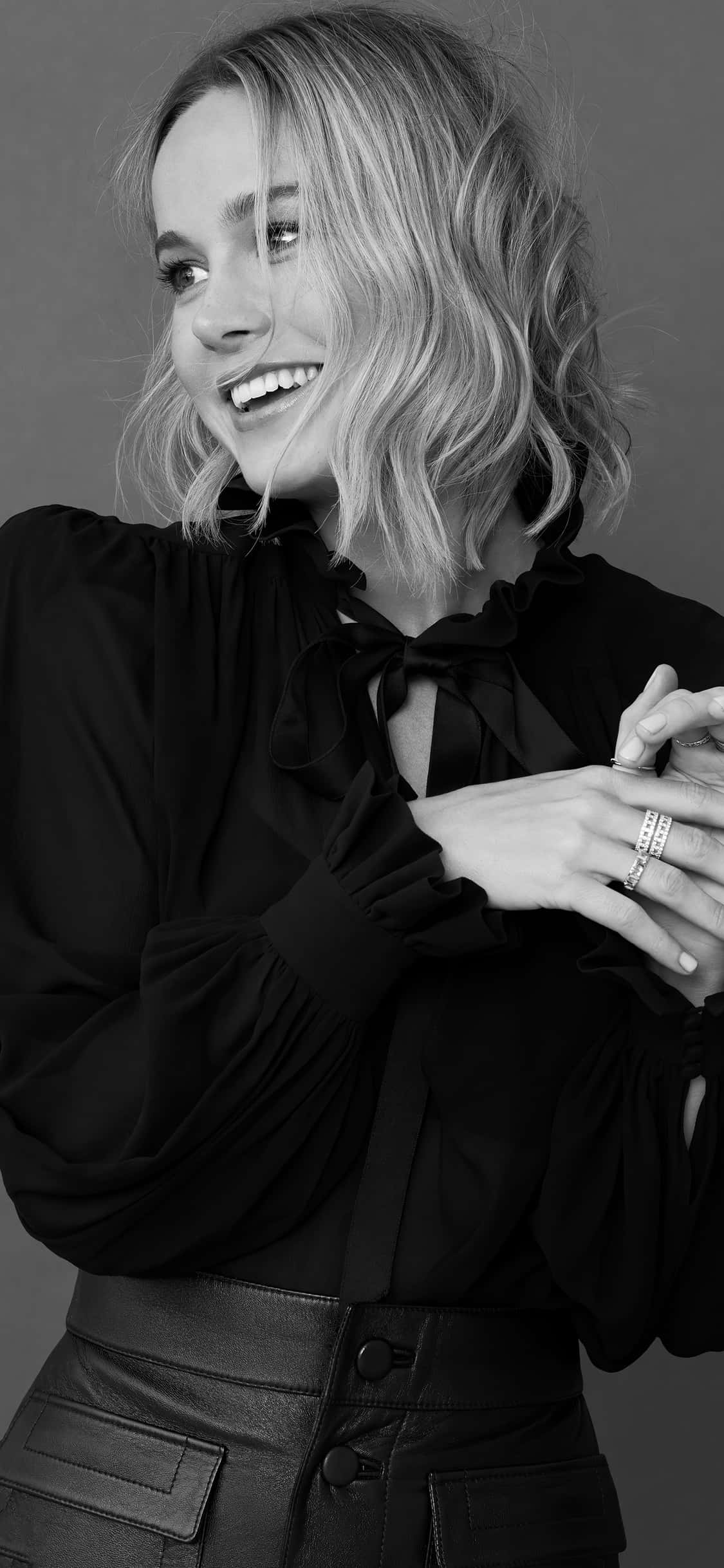 Brie Larson, wavy blonde hair, black blouse, Full HD Phone Wallpaper