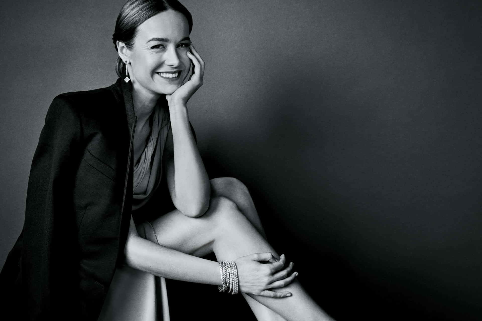 Brie Larson, black blazer, dark gray studio backdrop, Full HD Desktop Wallpaper