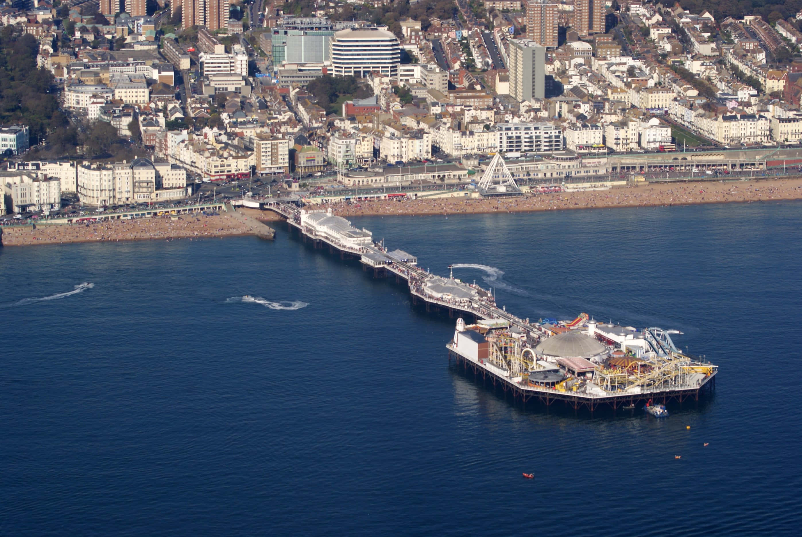 Brighton Pier, deep blue sea, bustling crowds, 2K Desktop Wallpaper