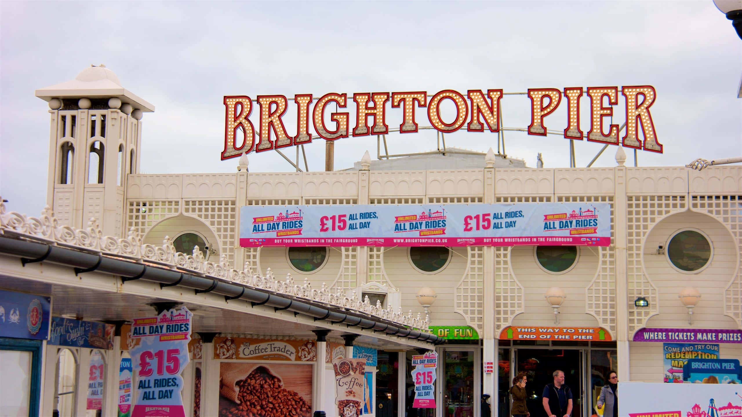 Brighton Pier, white architecture, glowing sign, 2K Desktop Wallpaper