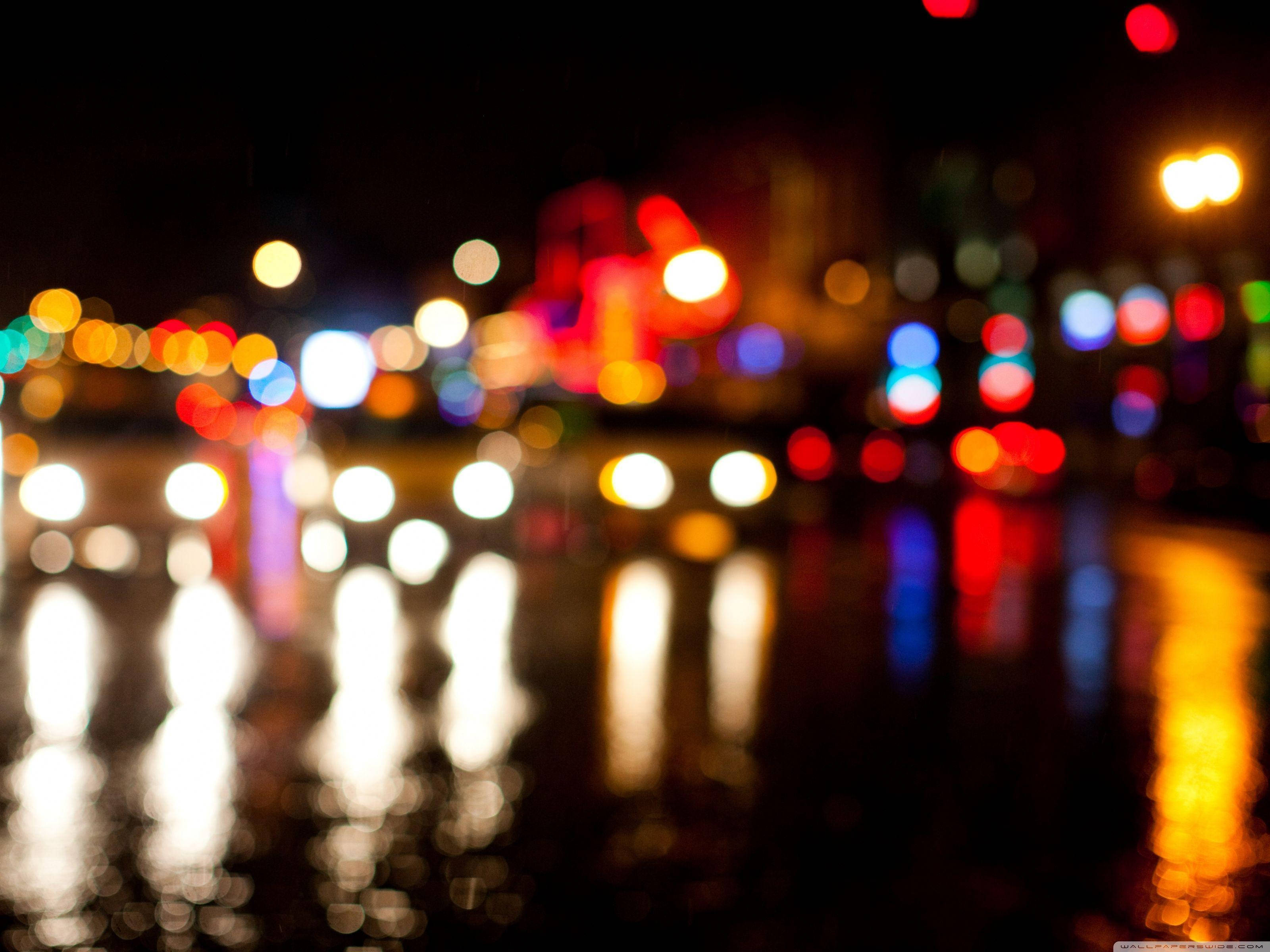Broadway, wet pavement, city vehicles, 2K Desktop Wallpaper