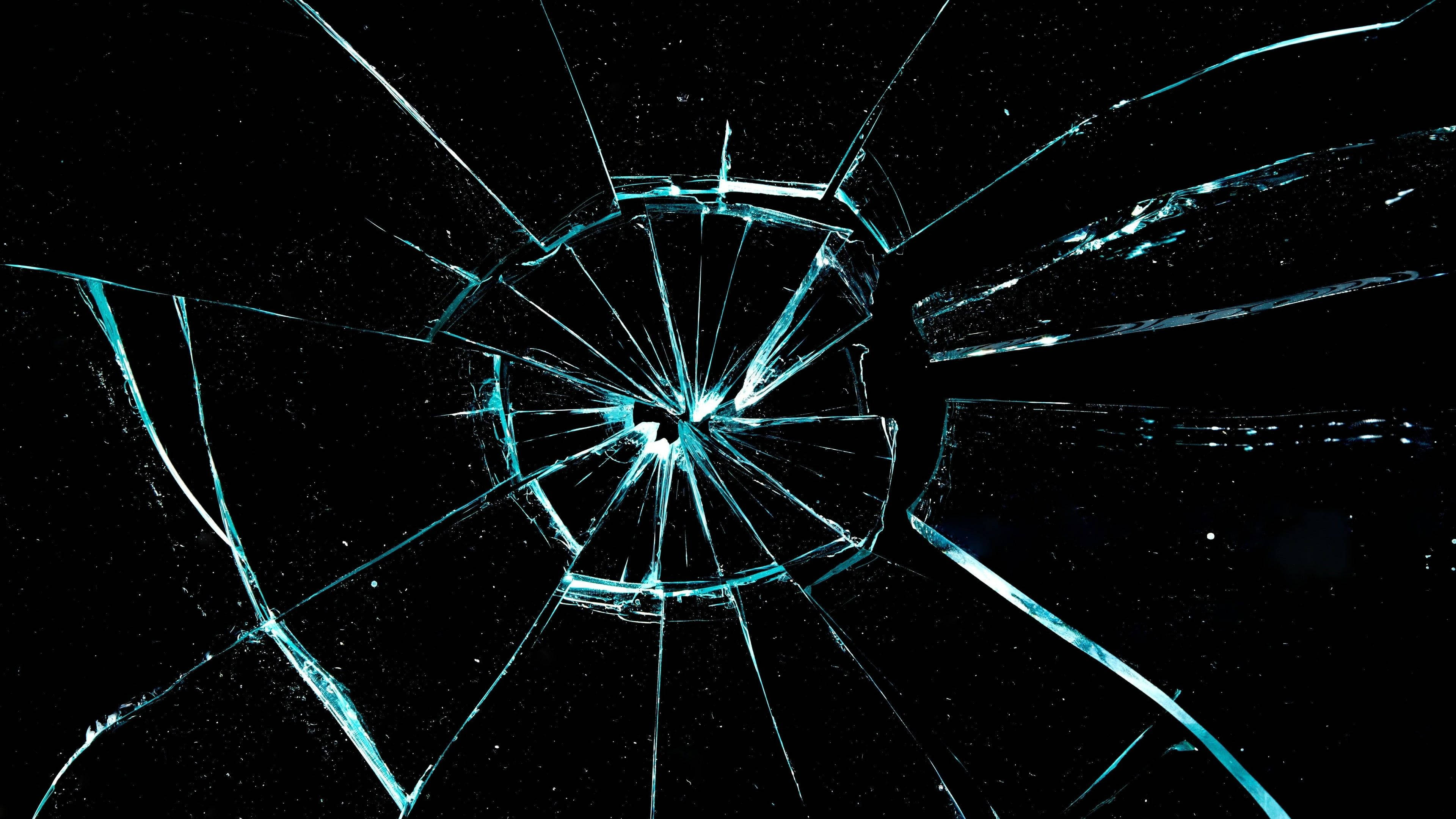 shattered computer lock screen, glowing blue cracks, central impact point, 4K Desktop Wallpaper