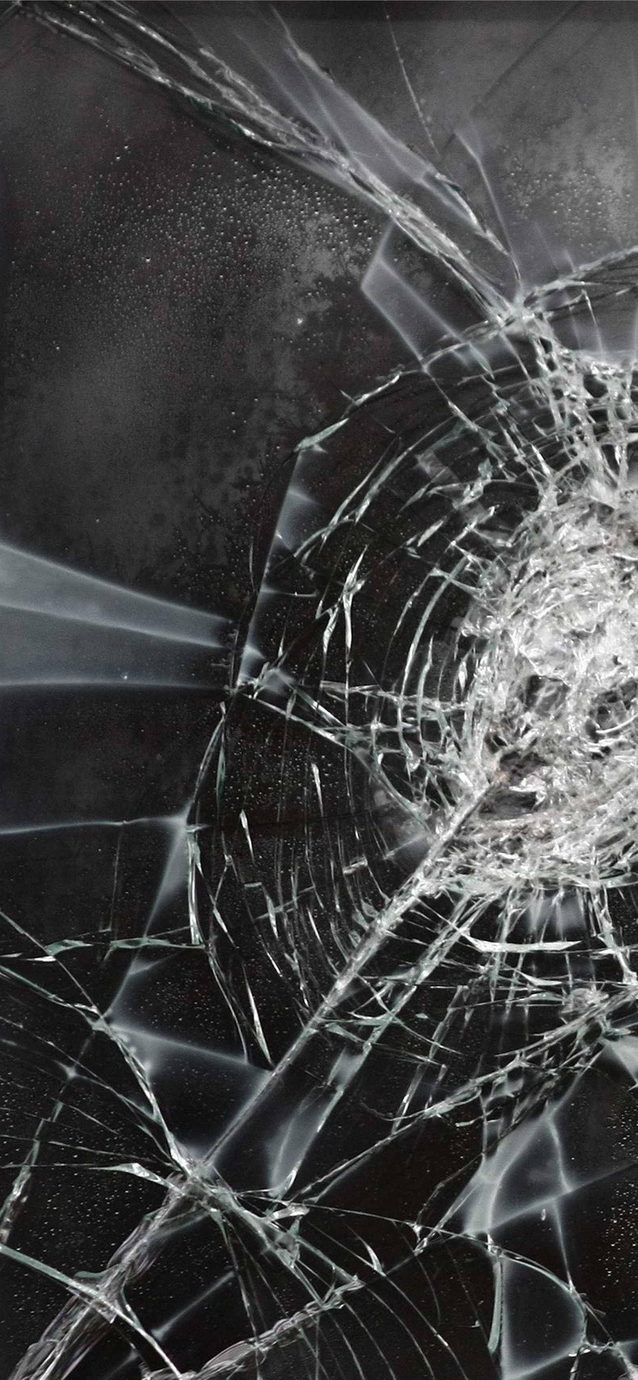 cracked mirror, shattered glass, central impact point, 2K Phone Wallpaper