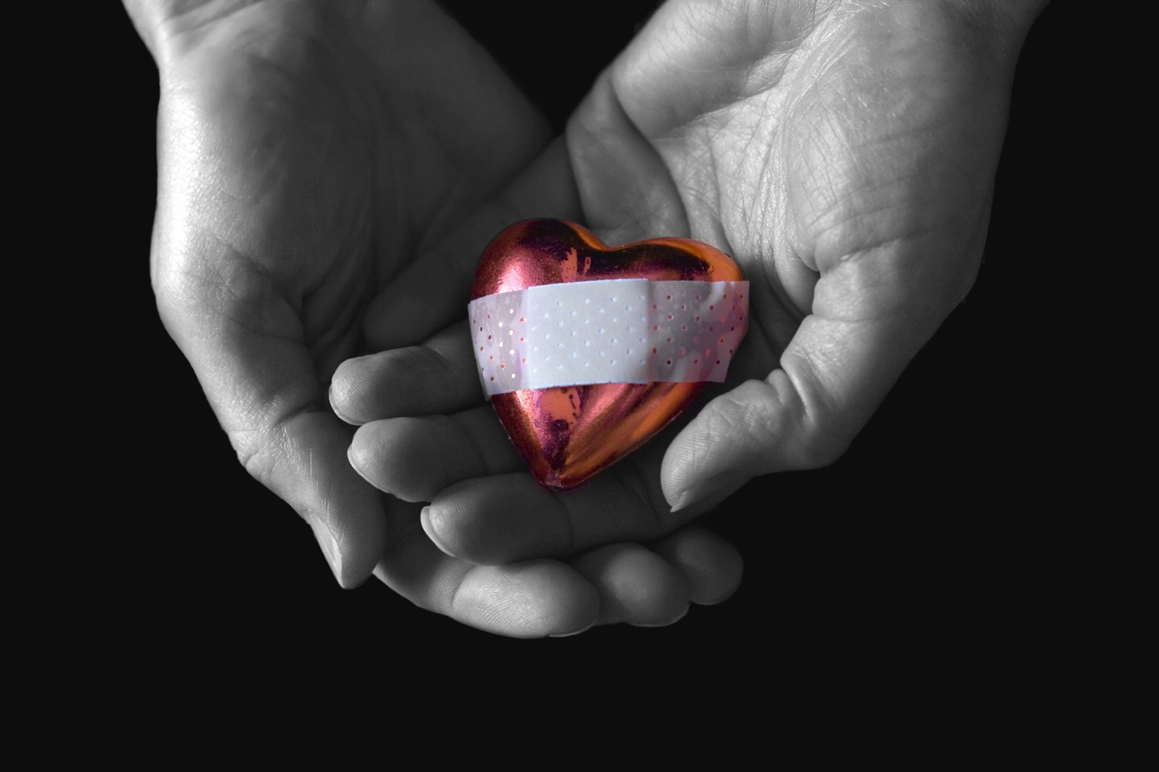 hand holding bandaged broken heart 4k, shiny red heart, white bandage, 4K Desktop Wallpaper