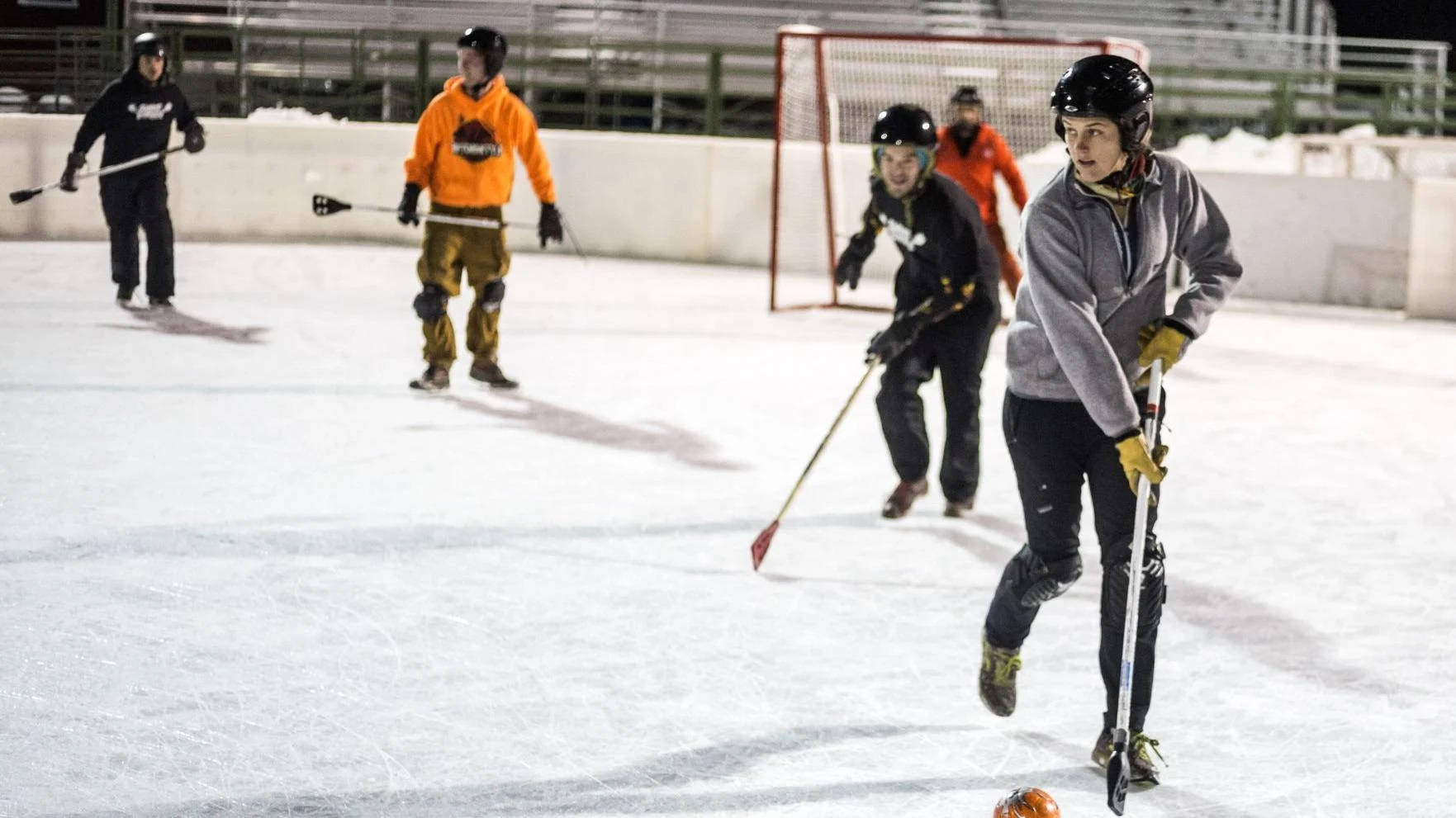 woman broomball athlete, competitive broomball game, outdoor rink, HD Desktop Wallpaper
