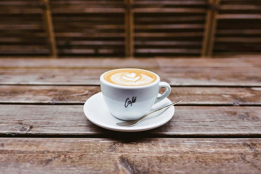 white ceramic coffee cup, latte art, rustic wooden table, SD Desktop Wallpaper