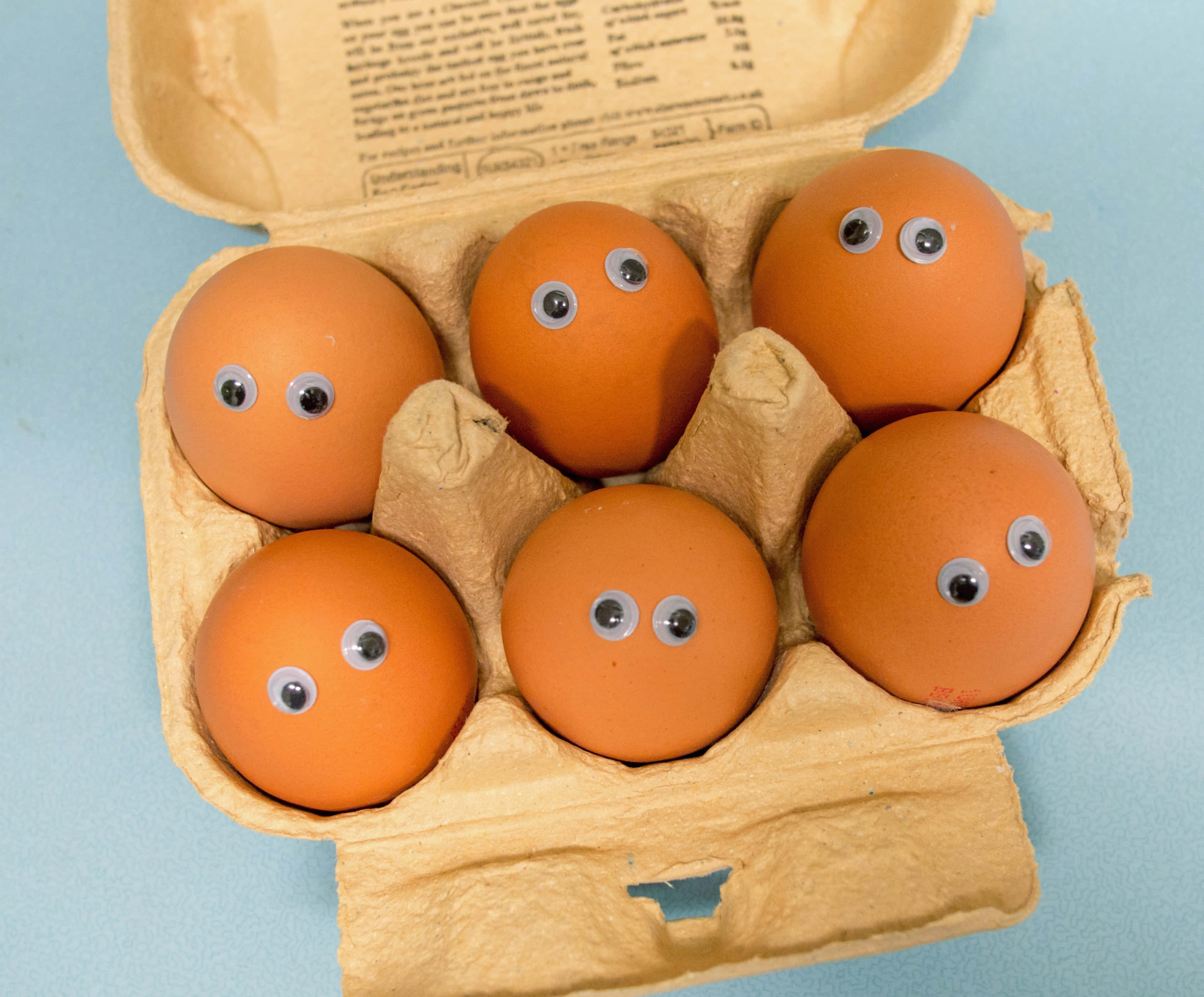brown eggs, rustic wooden table, cardboard carton, 2K Desktop Wallpaper