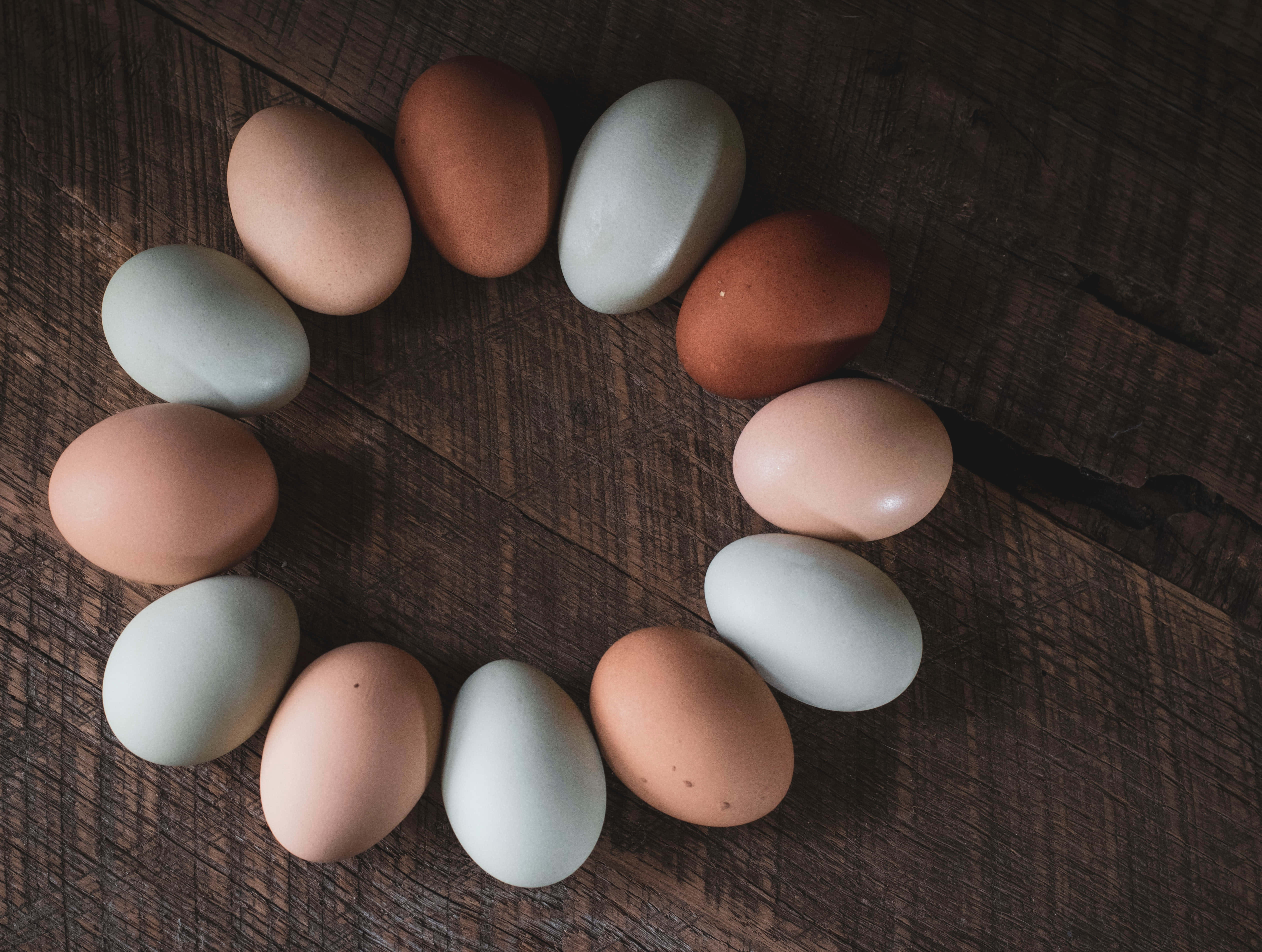 brown eggs, rustic table, dark rustic wooden surface, 4K Desktop Wallpaper