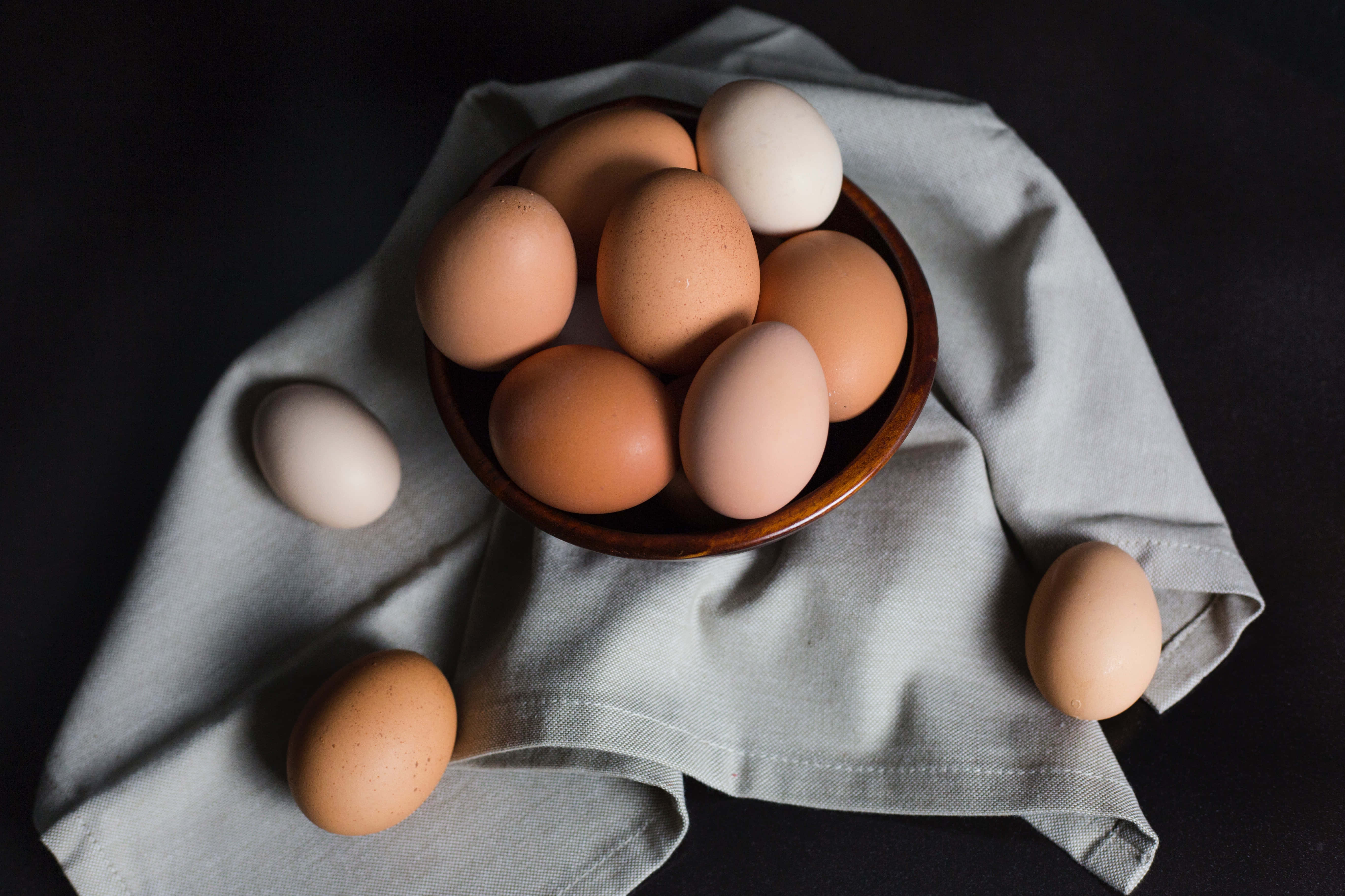 brown eggs, wooden bowl, light gray cloth, 5K Desktop Wallpaper