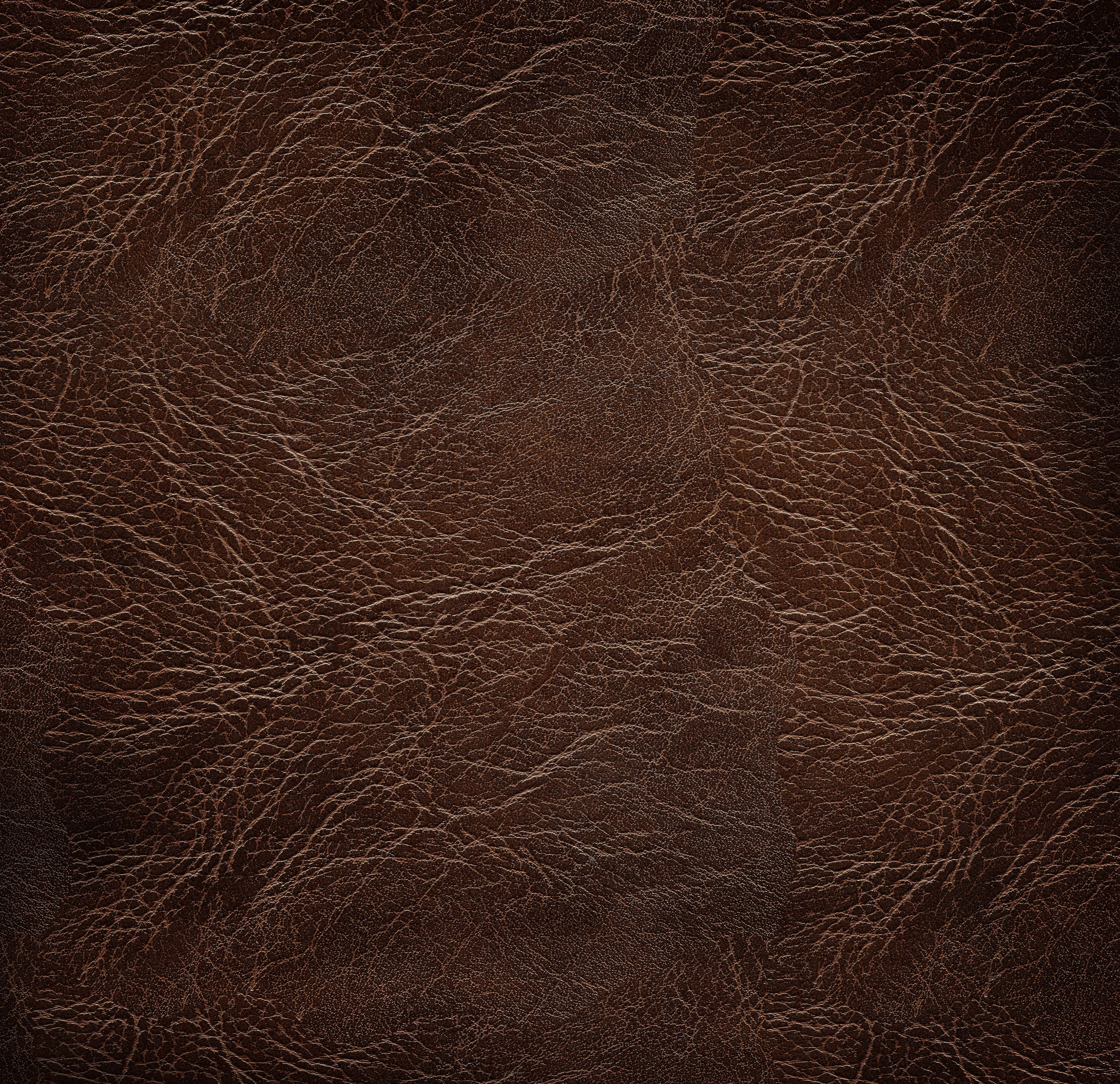 brown leather, natural creases, subtle texture variations, 4K Desktop Wallpaper