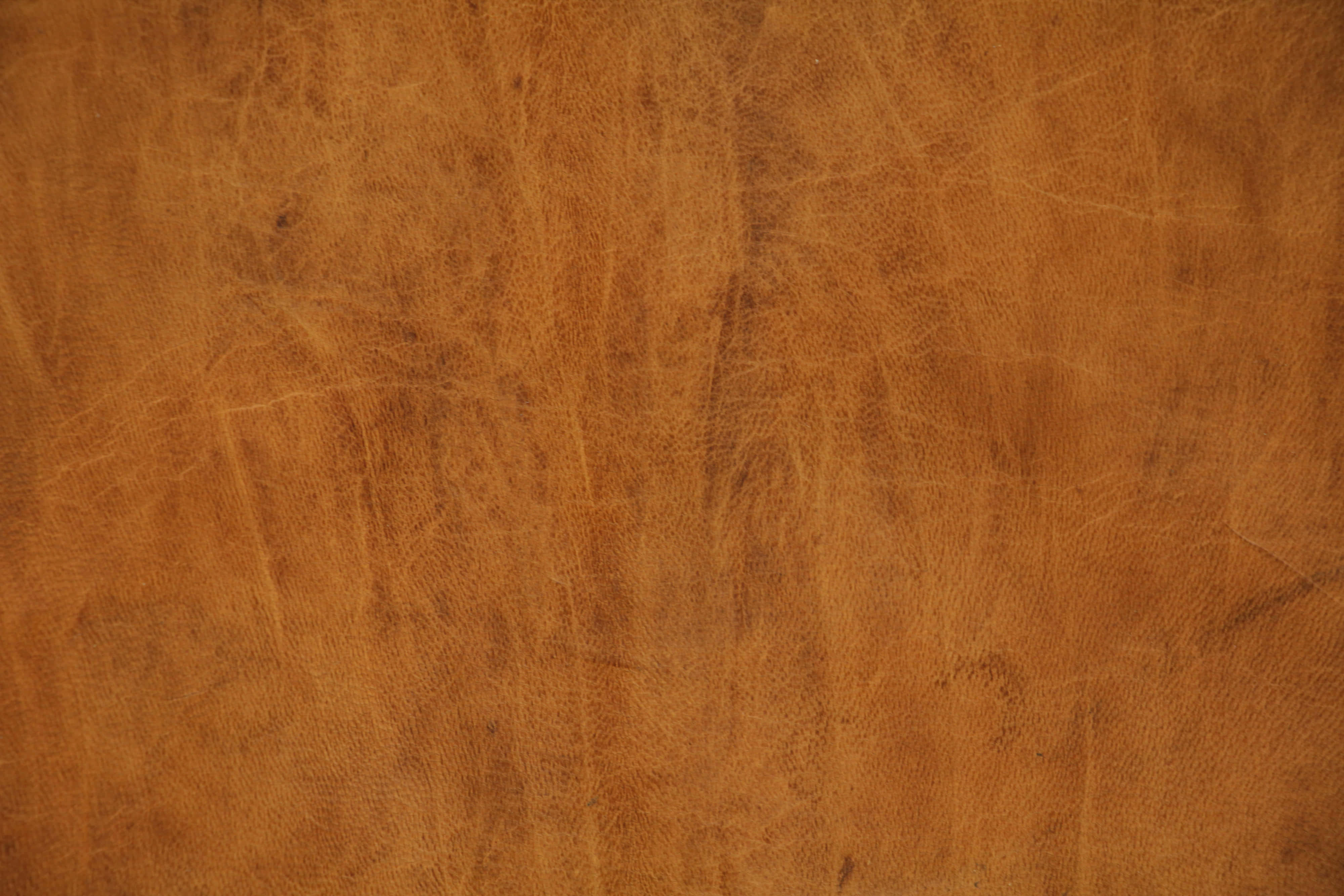 rich brown leather, natural grain scratches, subtle texture variations, 4K Desktop Wallpaper