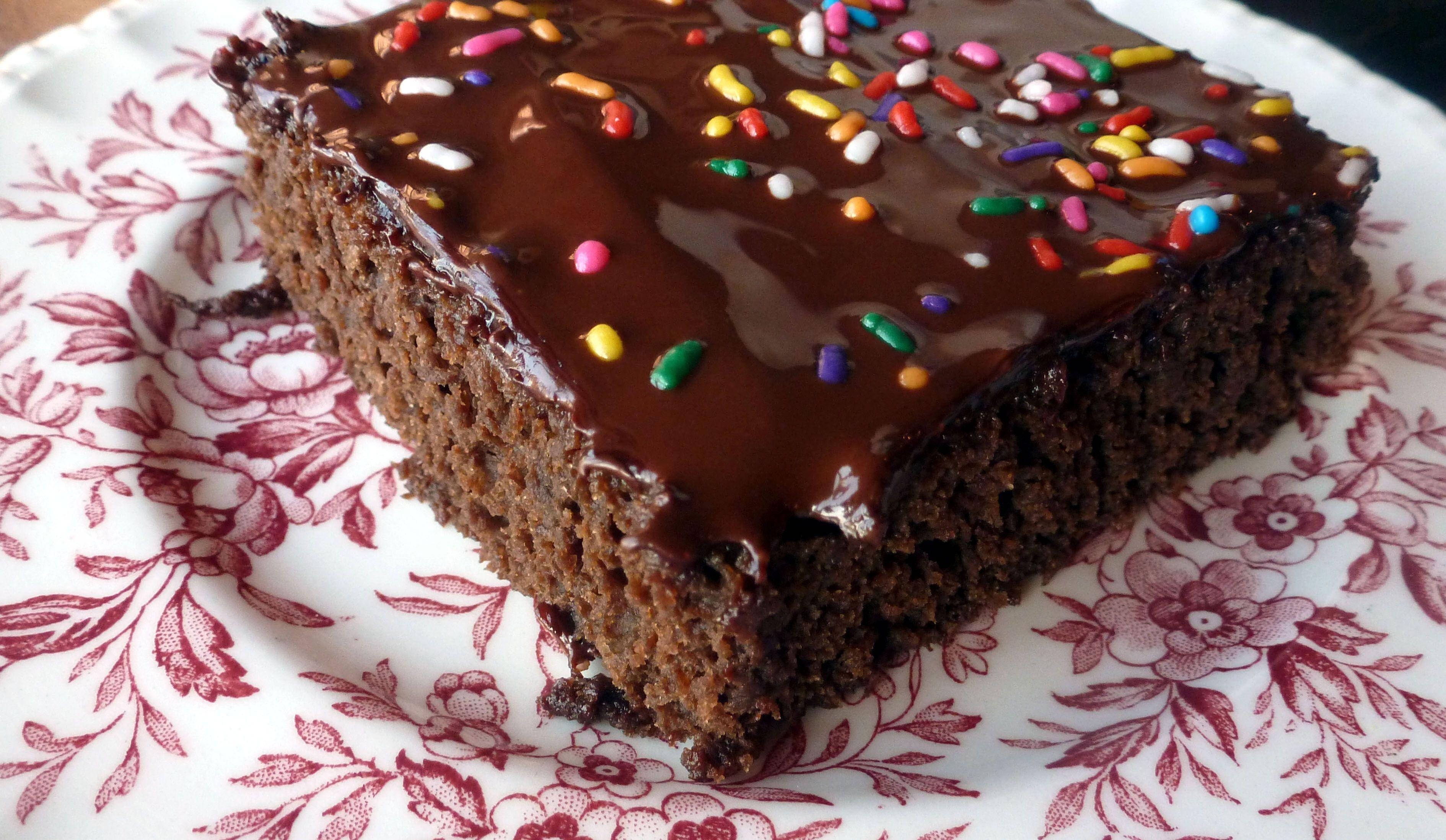 chocolate brownie, glossy chocolate glaze, colorful sprinkles, 2K Desktop Wallpaper