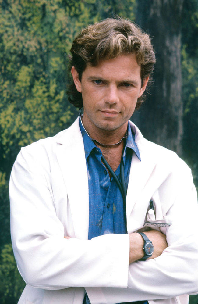Bruce Greenwood, white lab coat, lush green forest, SD Phone Wallpaper