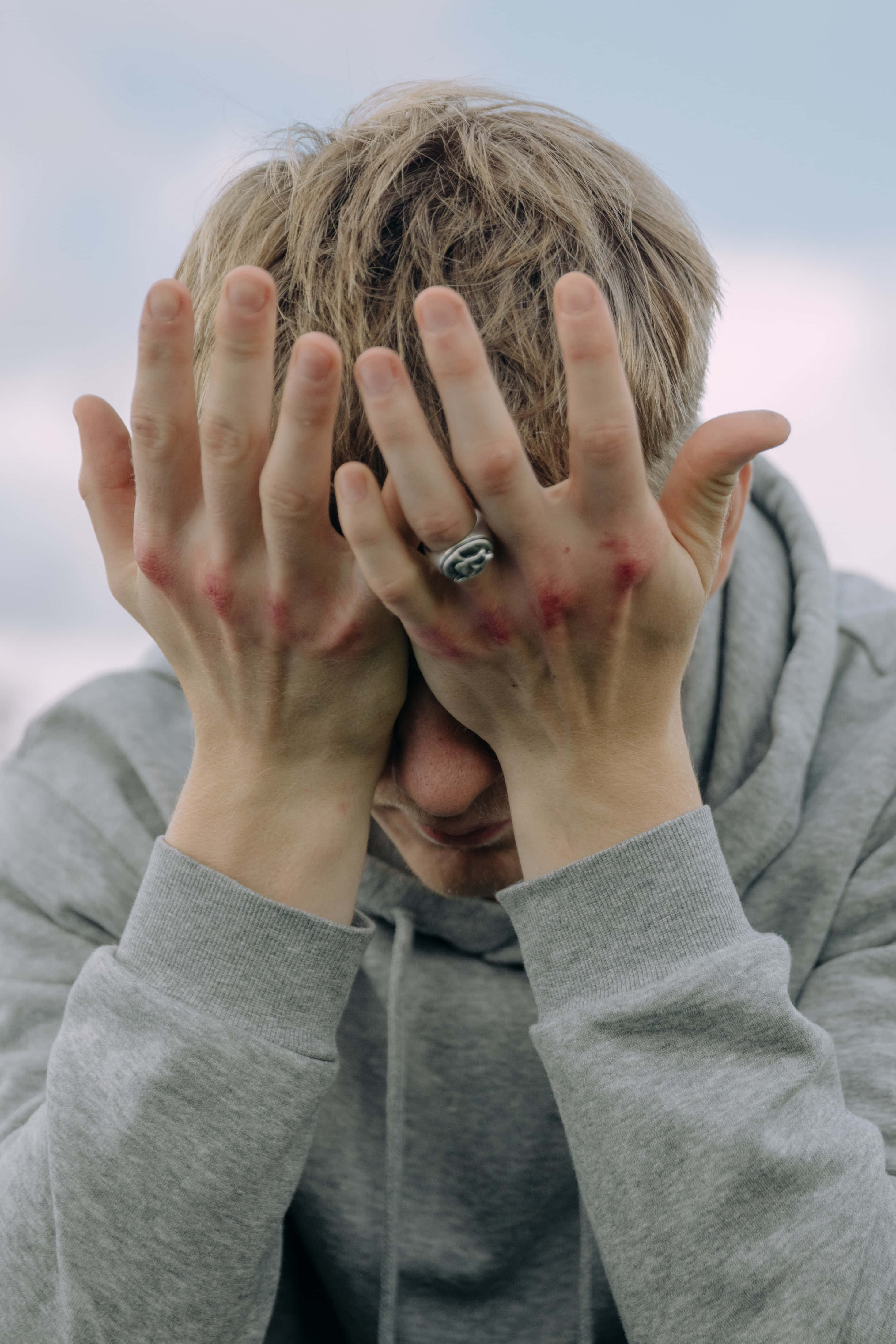 gray hoodie, red marks, pale sky, 4K Phone Wallpaper