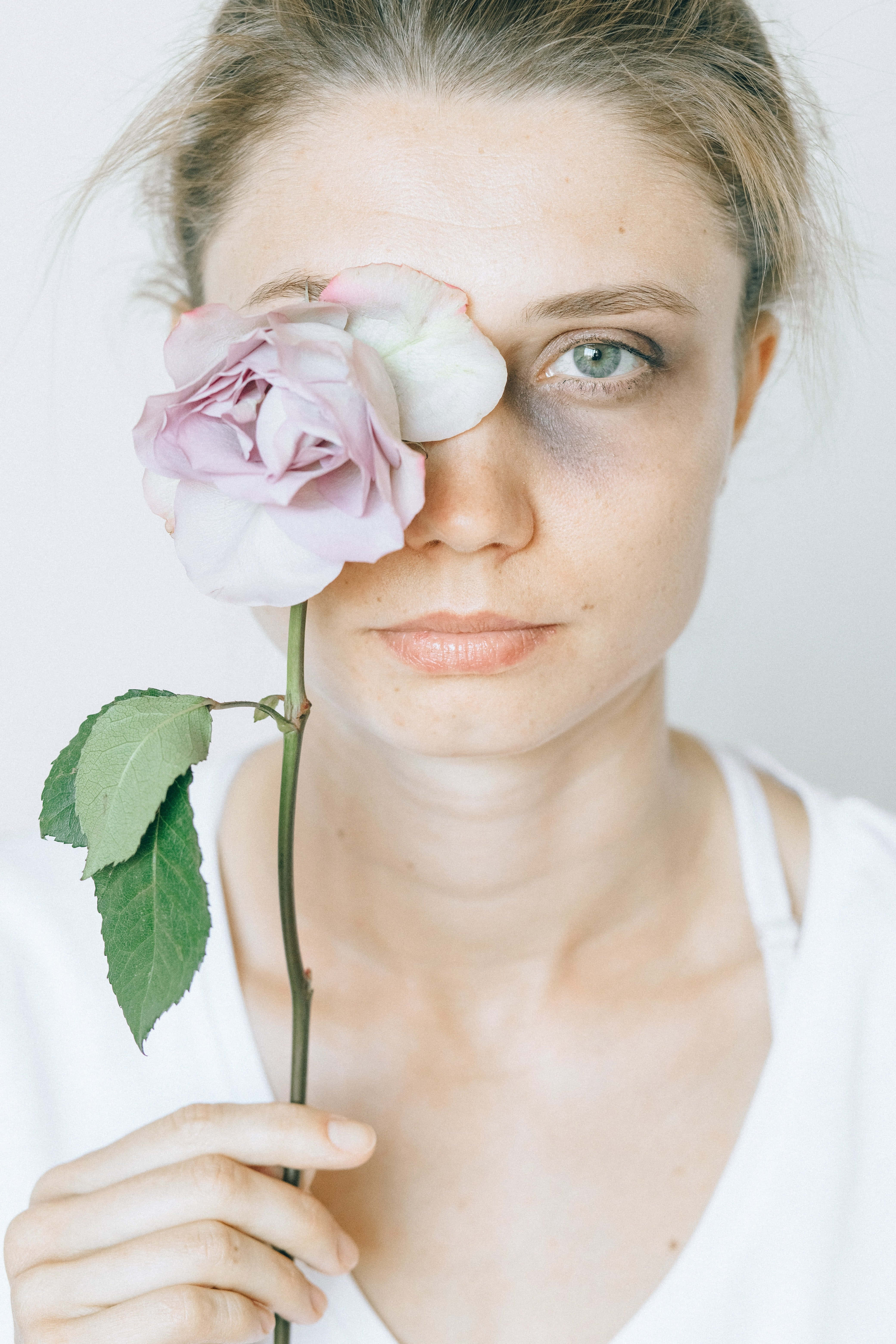 bruised girl, pale pink rose, white background, 5K Phone Wallpaper