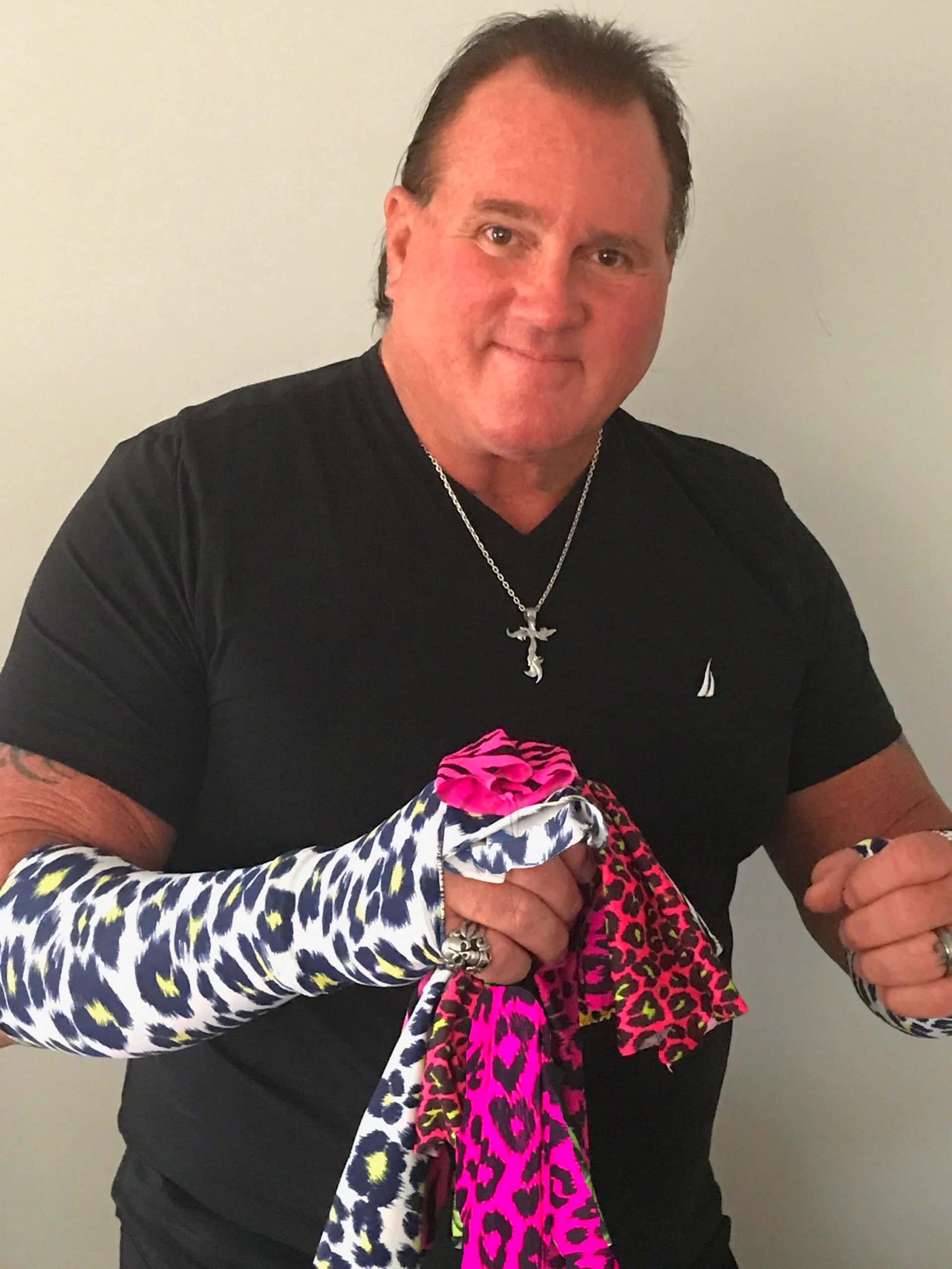 Brutus Beefcake, black shirt, vibrant pink and blue leopard print fabric, 2K Phone Wallpaper