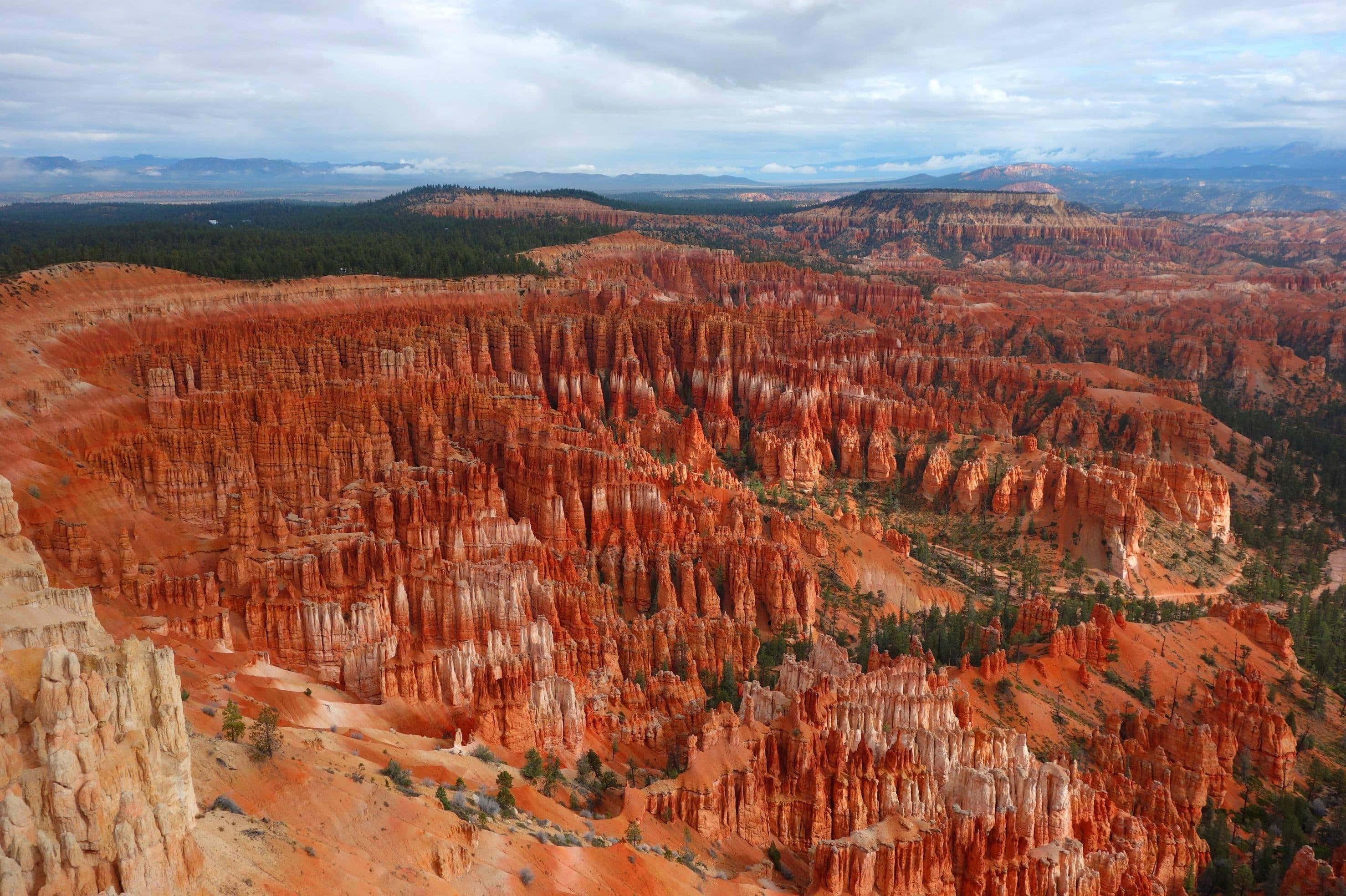 Bryce Canyon National Park, orange hoodoos, cloudy sky, 2K Desktop Wallpaper