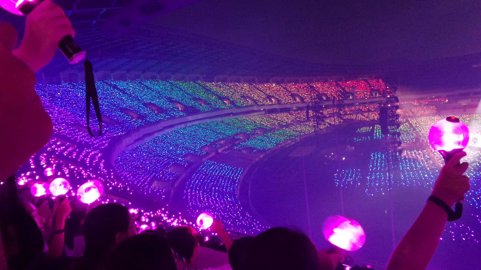 Bts Army Bomb, glowing pink and blue light sticks, massive stadium, Full HD Desktop Wallpaper