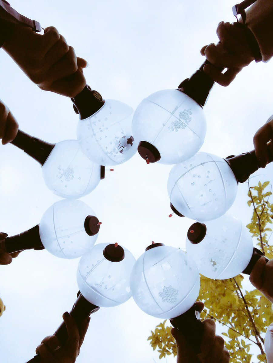 BTS ARMY Bomb, glowing white lanterns, bright sky, SD Phone Wallpaper