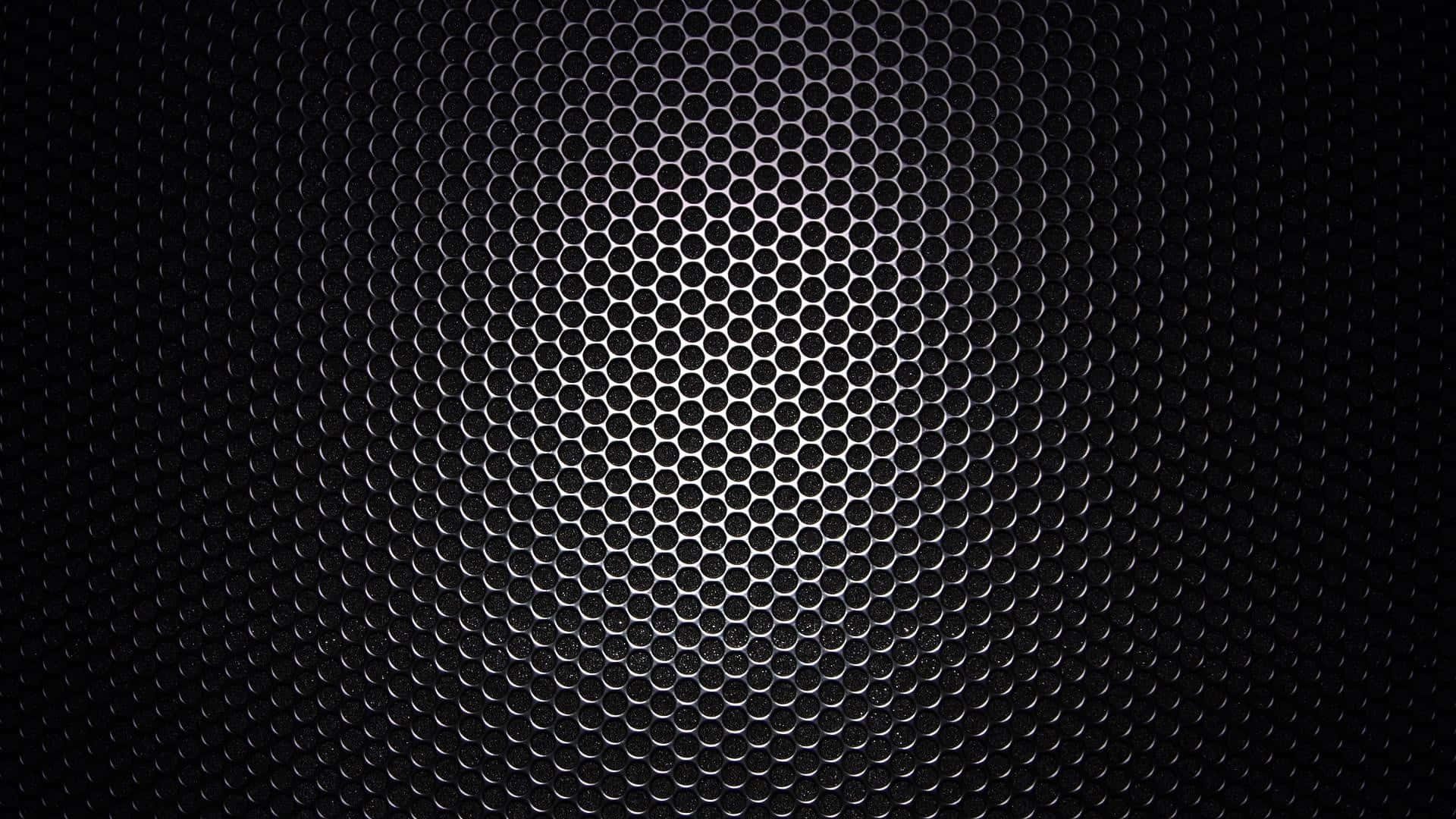 black gradient, dark metallic hexagonal mesh, bright central highlight, Full HD Desktop Wallpaper