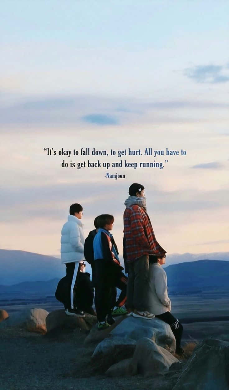BTS Lyrics, rocky terrain, distant mountains, SD Phone Wallpaper