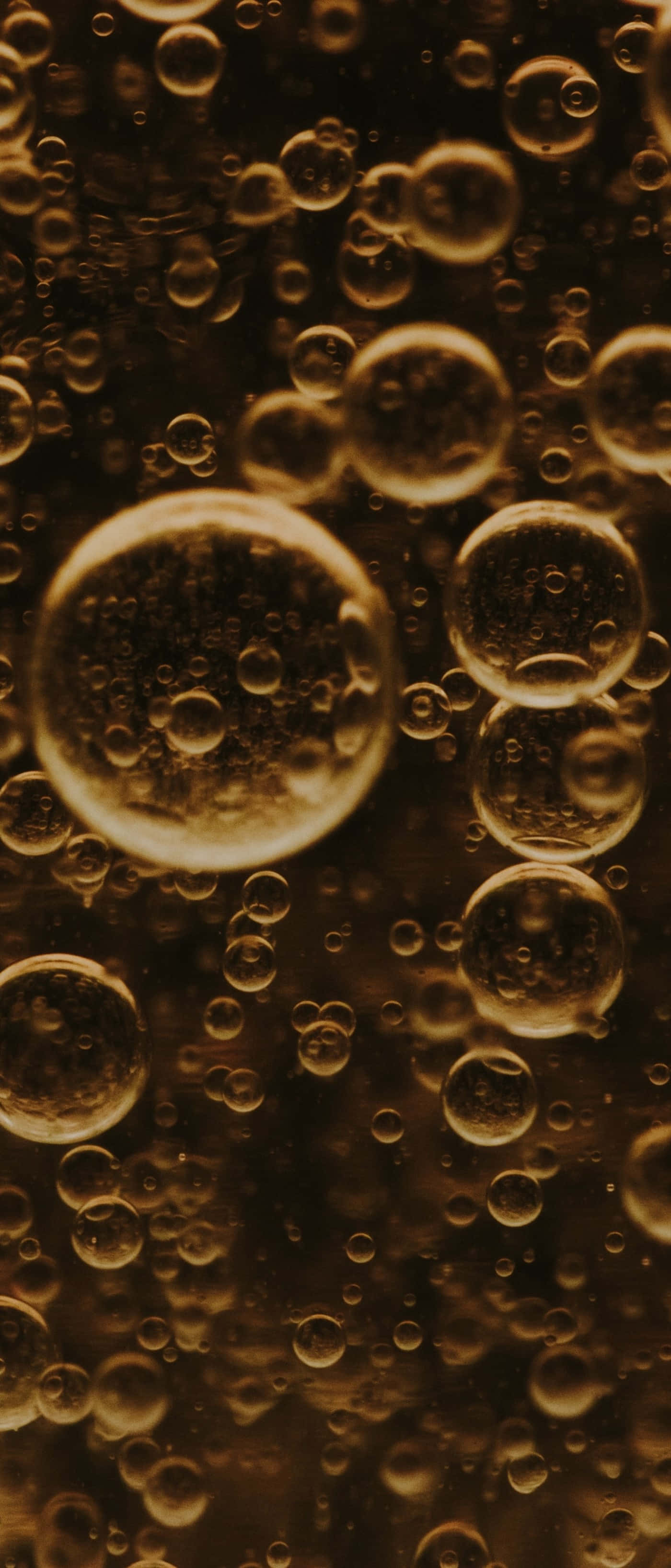 bubbles phone, golden amber, brown background, 2K Phone Wallpaper