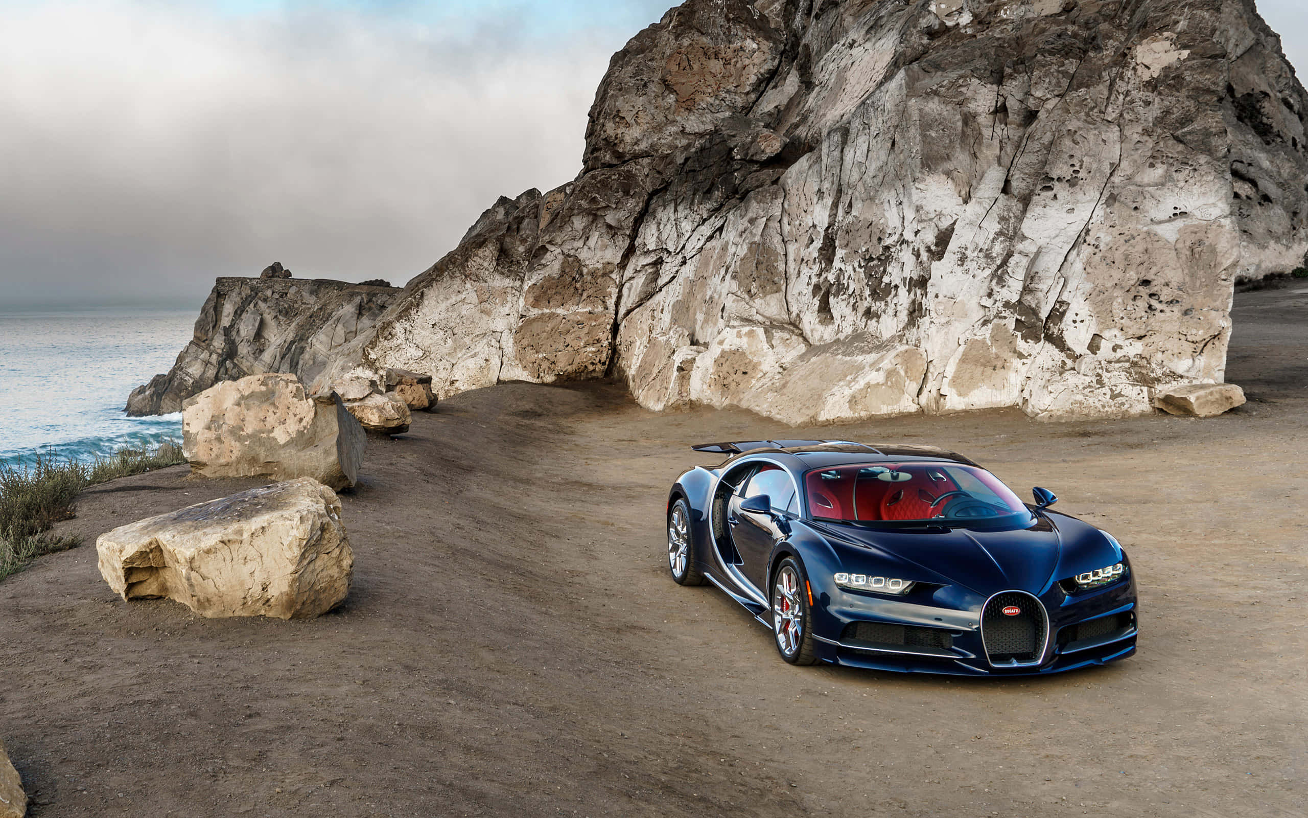 Bugatti Chiron, sleek blue, coastal cliffside, 2K Desktop Wallpaper