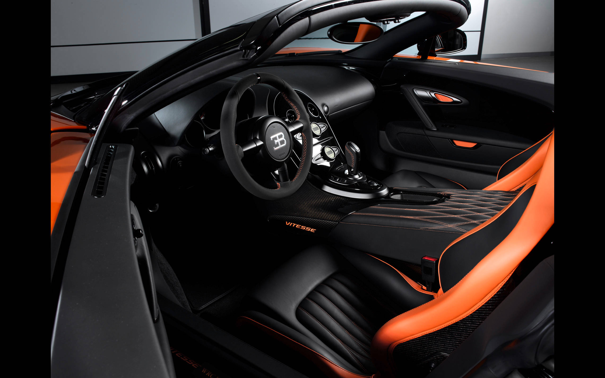 Bugatti, black and orange leather seats, carbon fiber accents, 2K Desktop Wallpaper