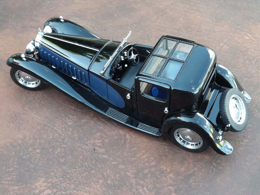 Bugatti Type 41 Royale, glossy black, blue accents, SD Desktop Wallpaper
