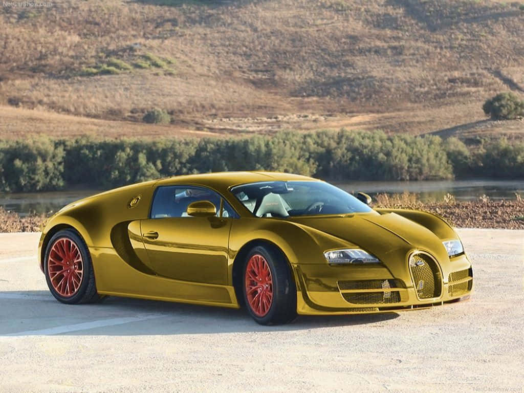 Gold Bugatti Veyron, red wheels, paved surface, SD Desktop Wallpaper