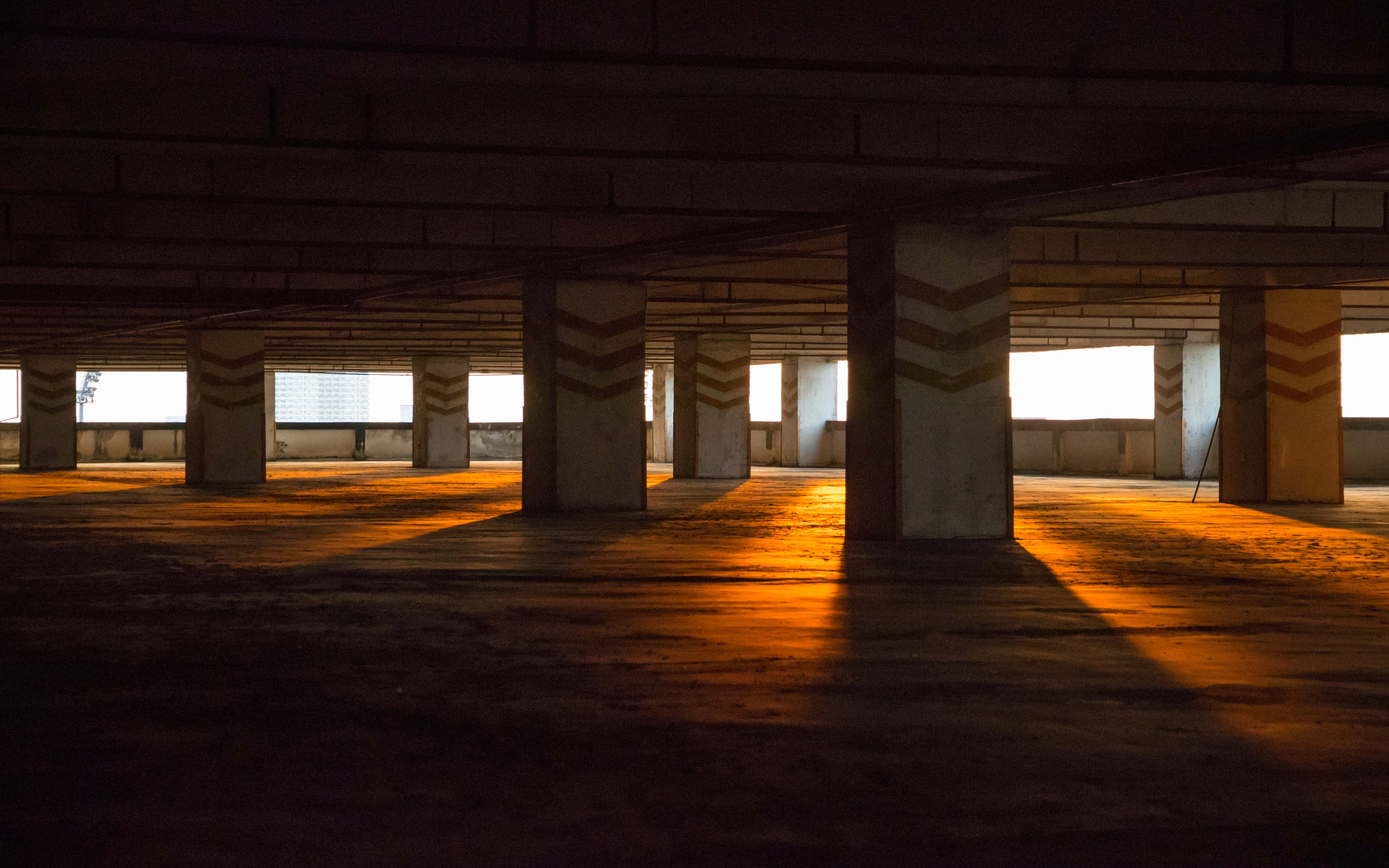 Sunlight, golden shadows, empty concrete parking garage, 4K Desktop Wallpaper