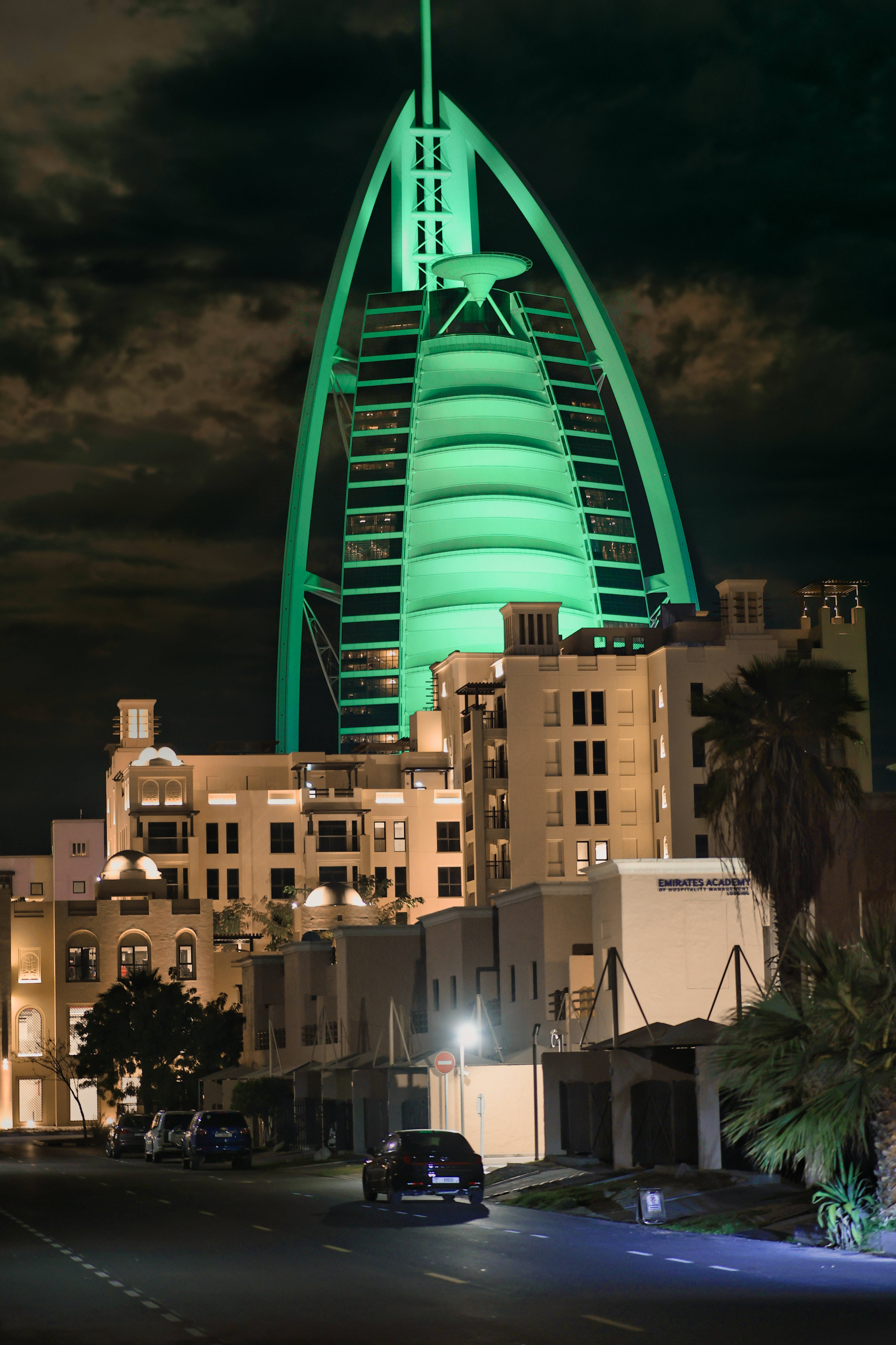 Burj Al Arab, green lights, dark cloudy night sky, 5K Phone Wallpaper