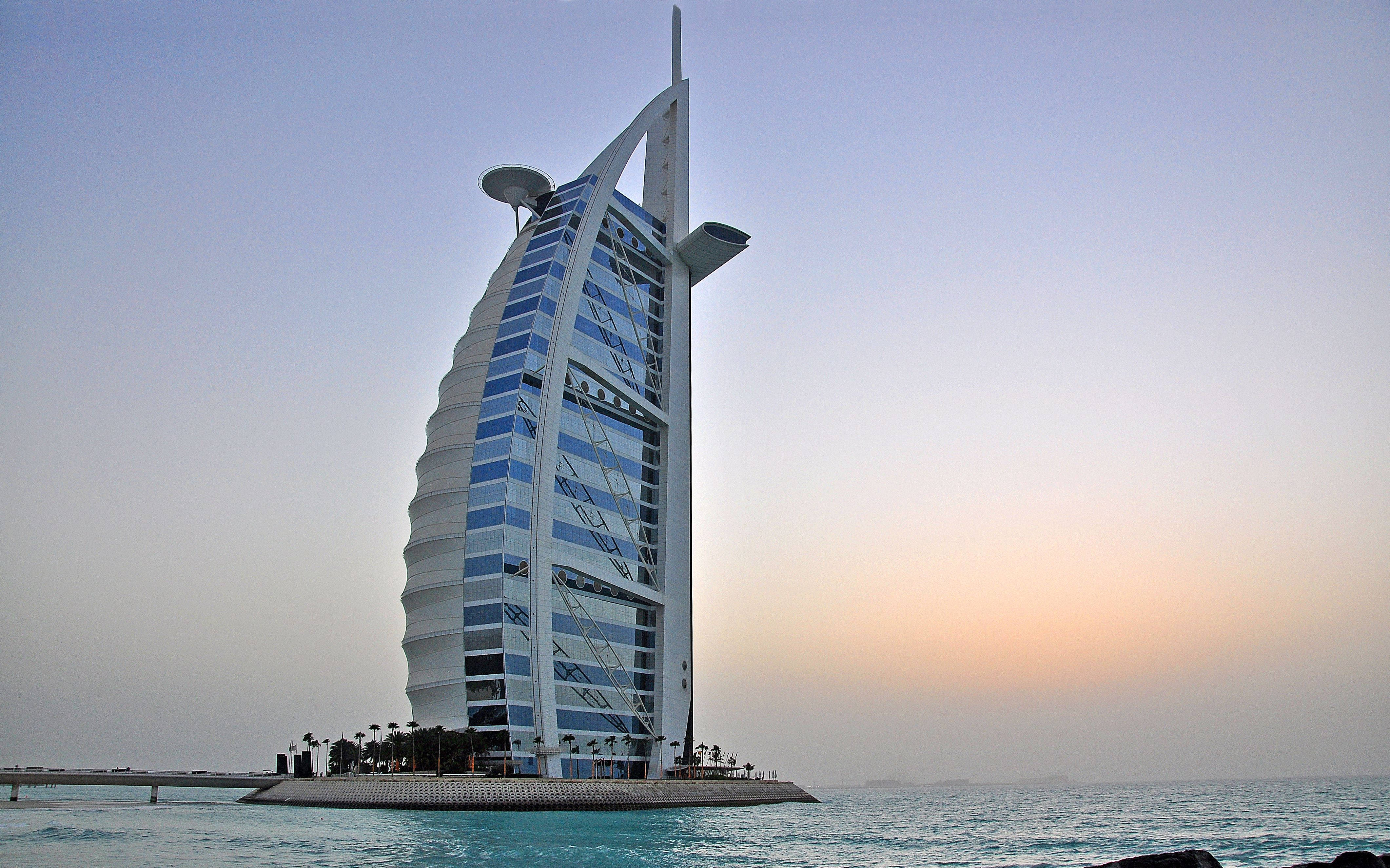 Burj Al Arab, sunset sky, calm turquoise waters, 4K Desktop Wallpaper