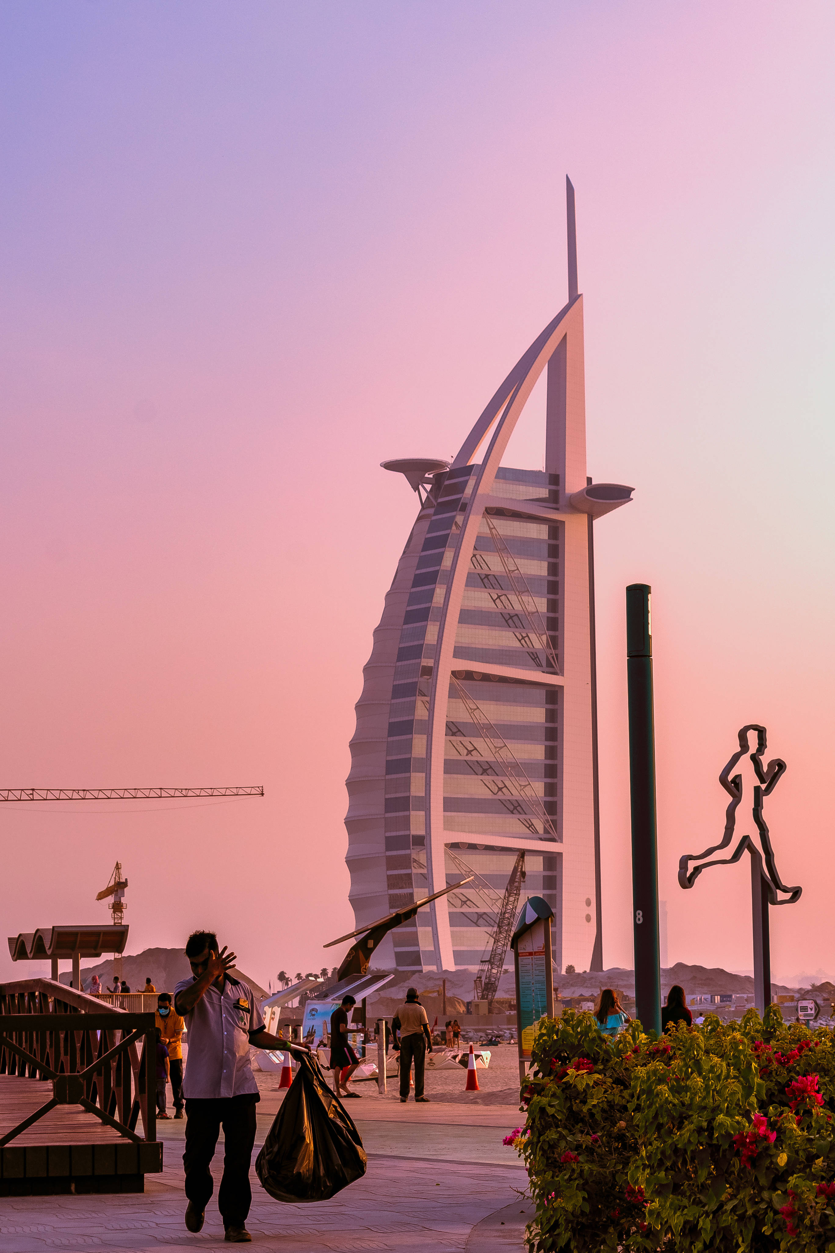 Burj Al Arab, pink sky, vibrant flowers, 4K Phone Wallpaper