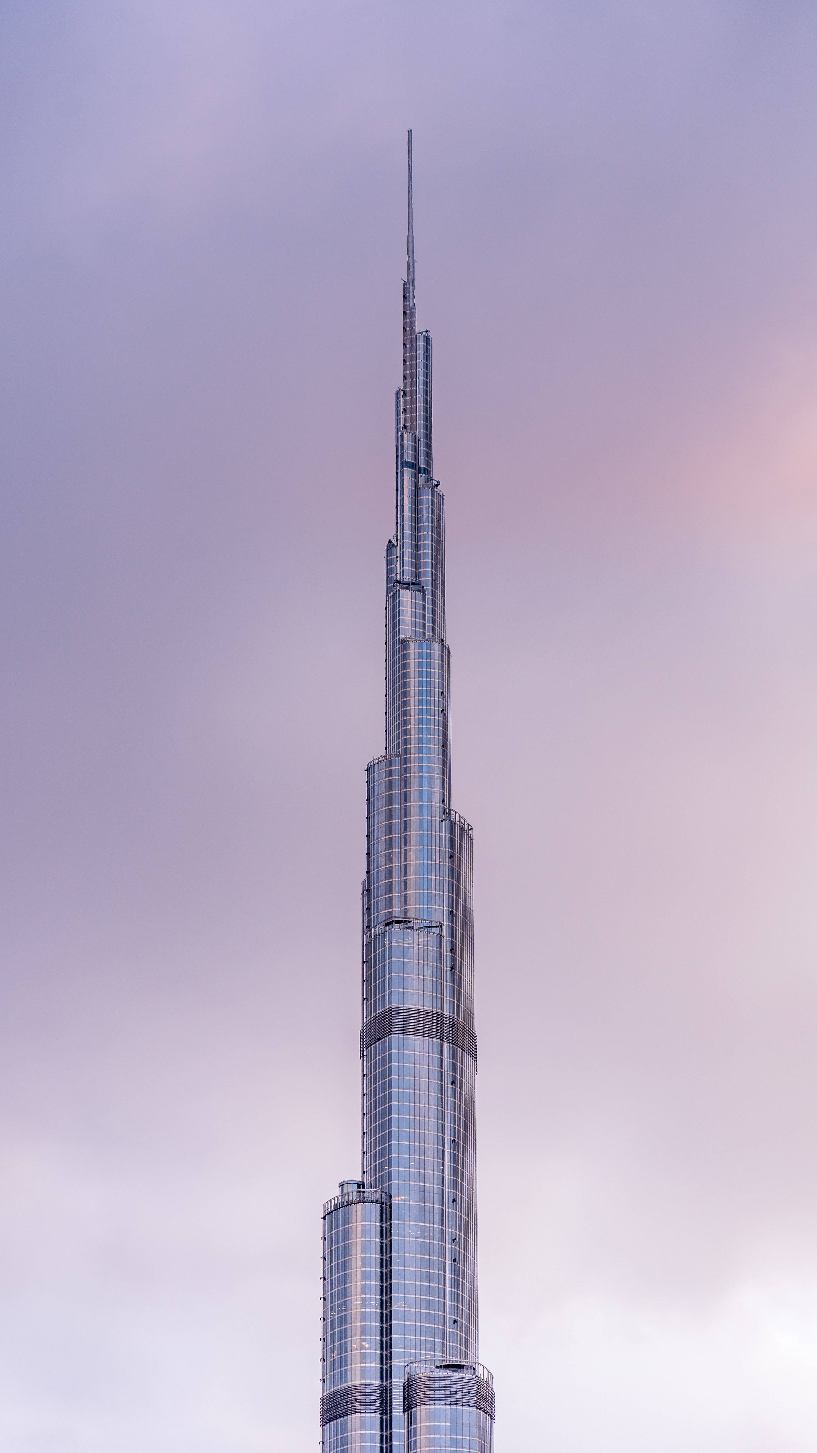 Burj Khalifa, lavender twilight sky, glass and steel spire, 5K Phone Wallpaper