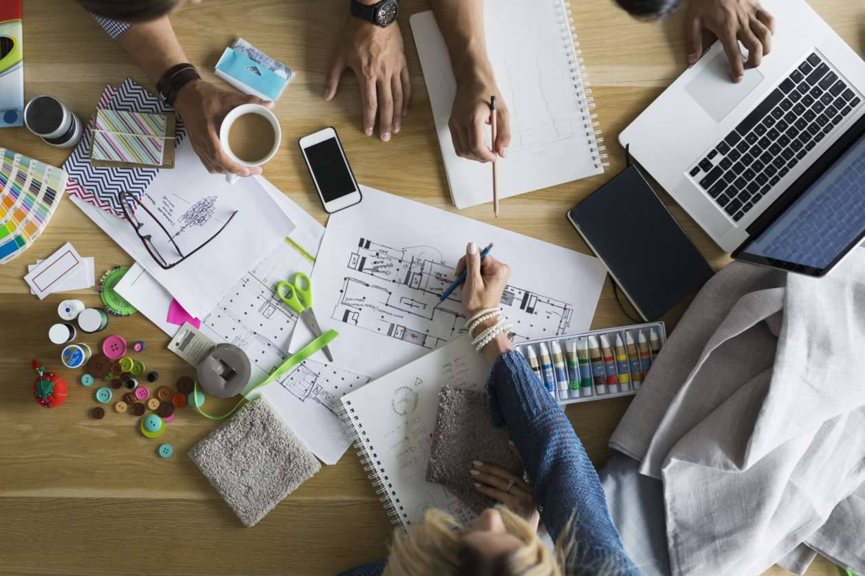 business budget planning, overhead view, designers collaborating, SD Desktop Wallpaper