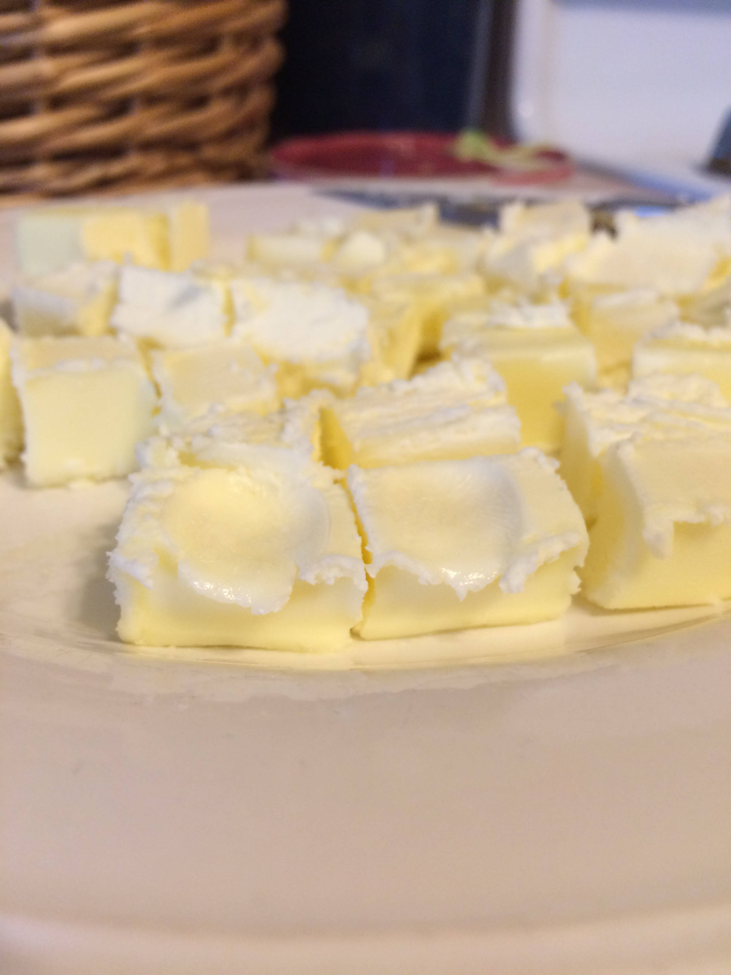 butter sticks, creamy pale yellow butter, white plate, 2K Phone Wallpaper