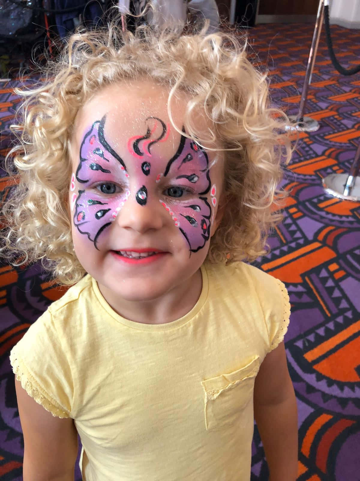 butterfly face paint, curly blonde hair, colorful patterned carpet, HD Phone Wallpaper